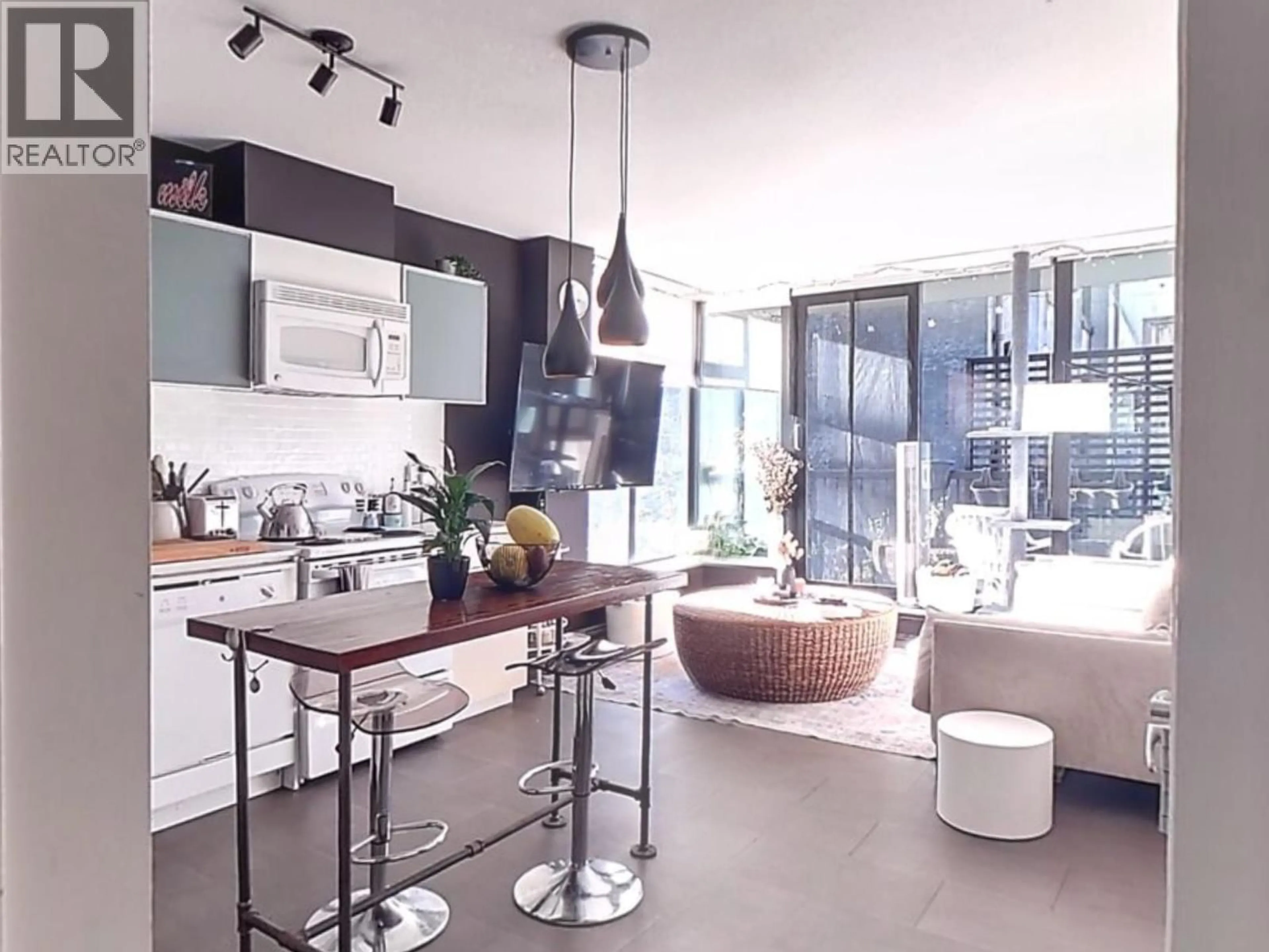Open concept kitchen, cement floor for 505 - 66 CORDOVA STREET, Vancouver British Columbia V6B0L2