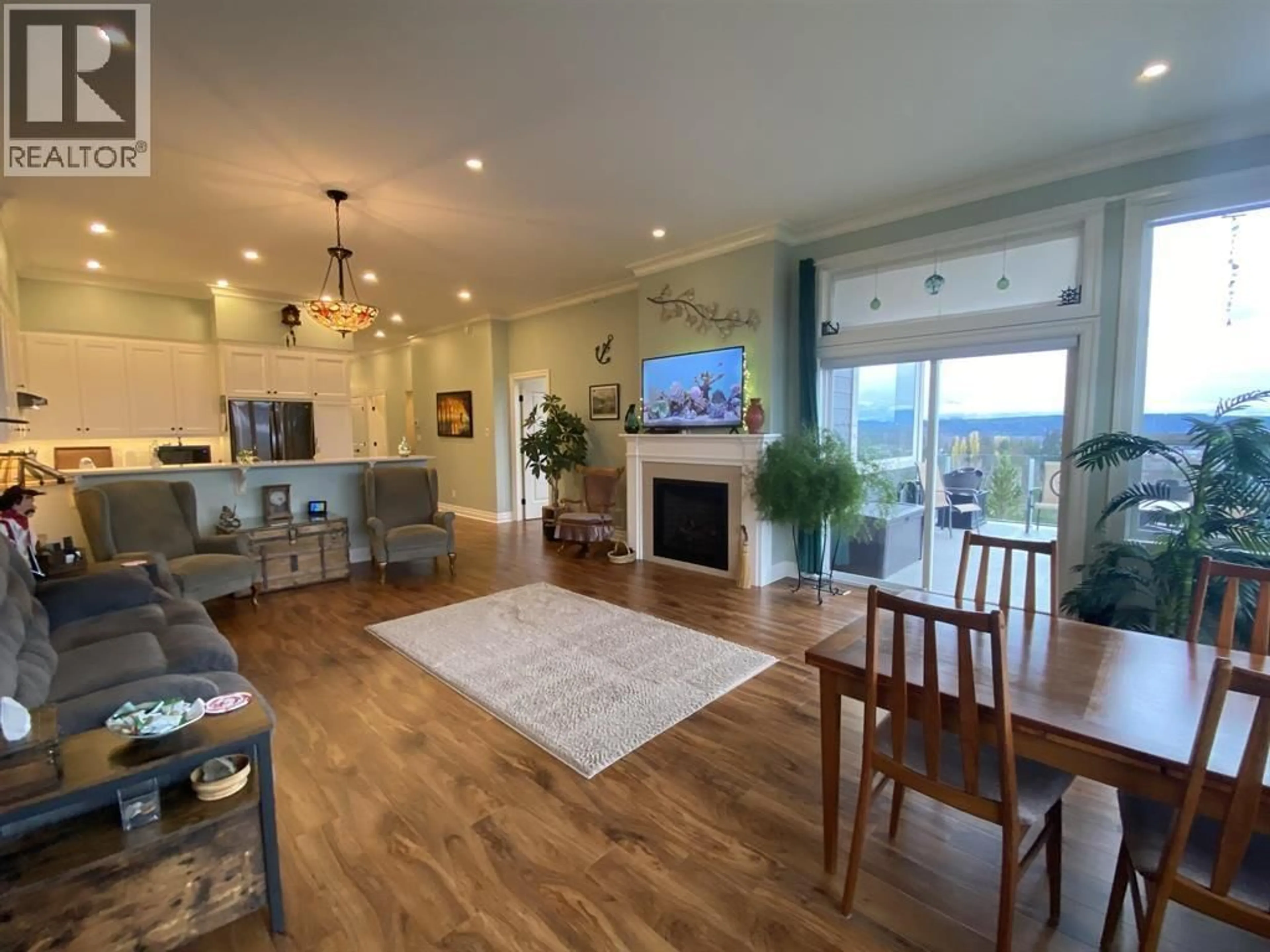 Living room with furniture, wood/laminate floor for 18 - 4022 YEO STREET, Terrace British Columbia V8G0H5