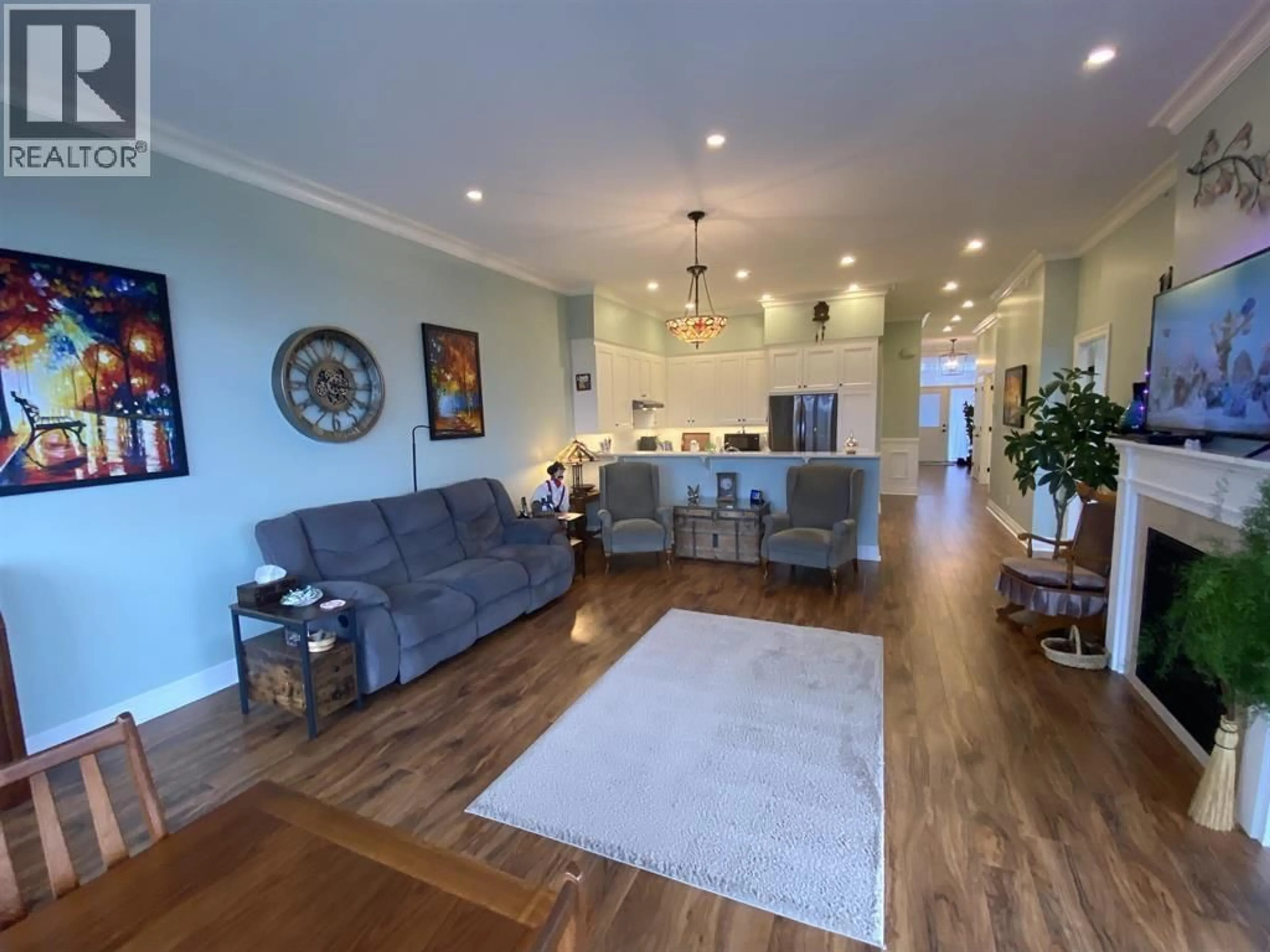 Living room with furniture, wood/laminate floor for 18 - 4022 YEO STREET, Terrace British Columbia V8G0H5