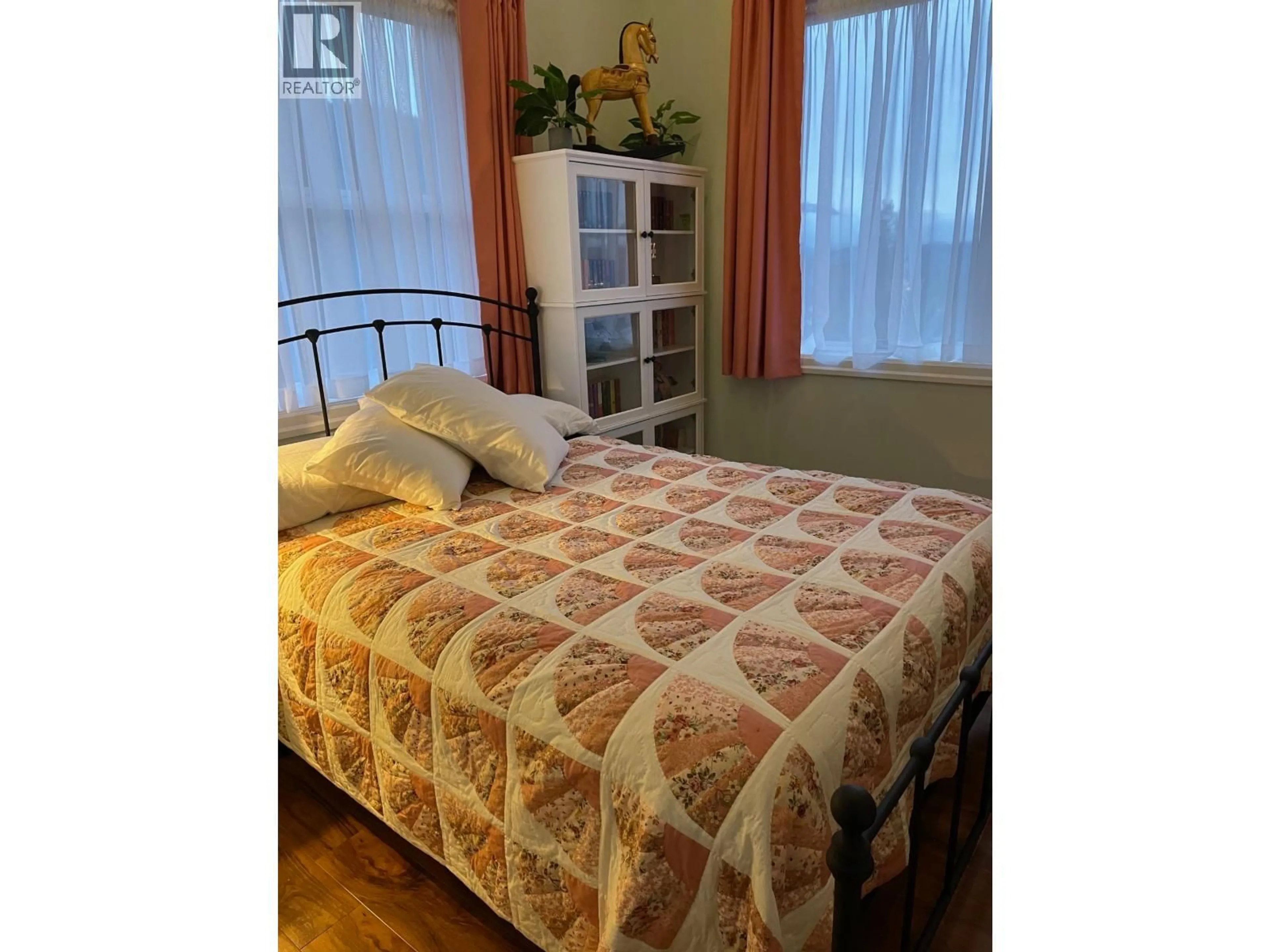 Bedroom with bed, wood/laminate floor for 18 - 4022 YEO STREET, Terrace British Columbia V8G0H5