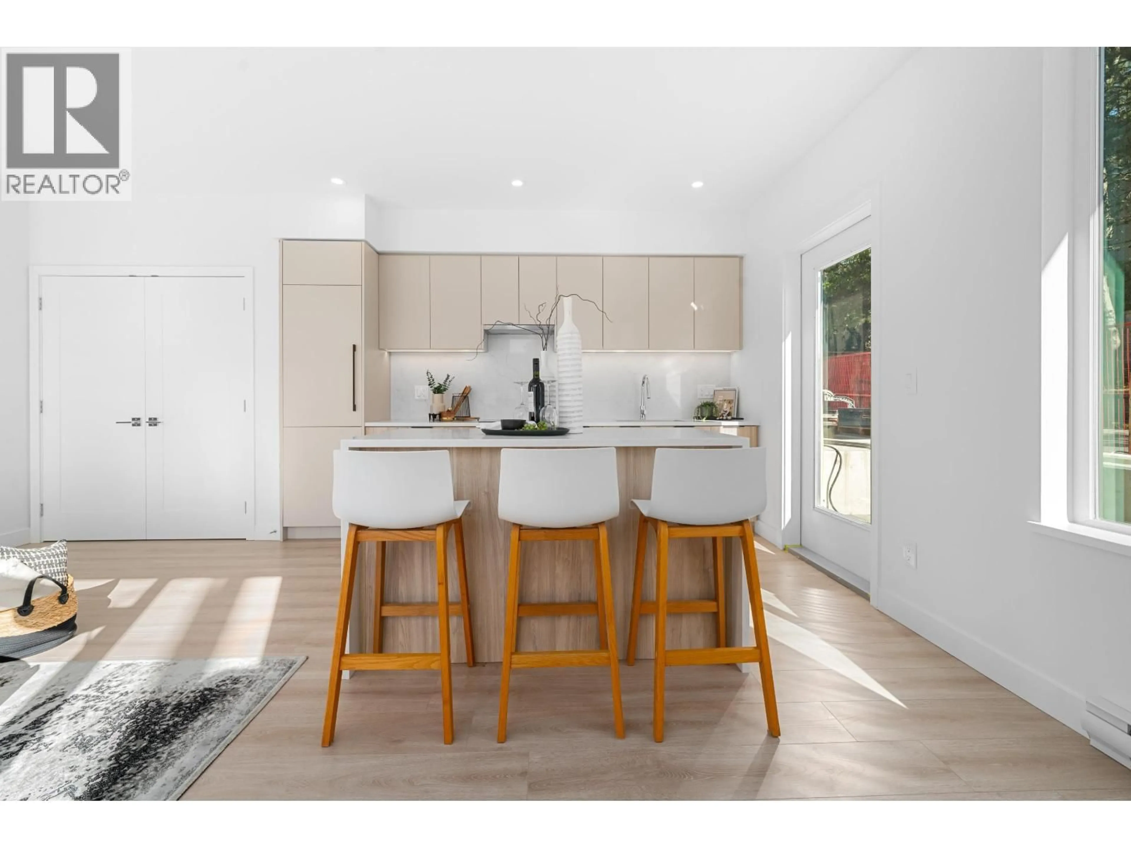 Open concept kitchen, wood/laminate floor for 109 - 7161 17TH AVENUE, Burnaby British Columbia V3N0K1