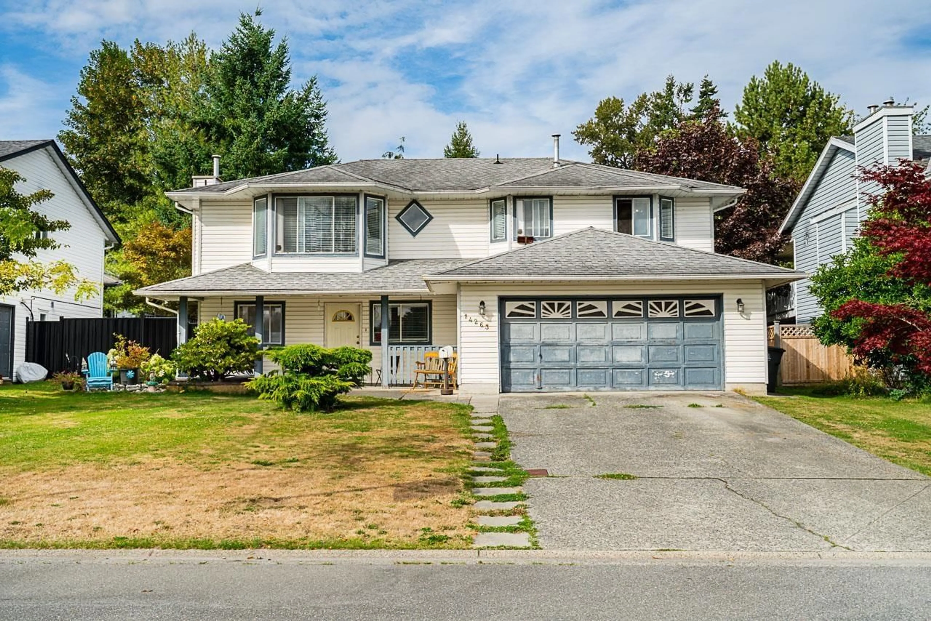 Home with vinyl exterior material, street for 14263 67, Surrey British Columbia V3W0P5