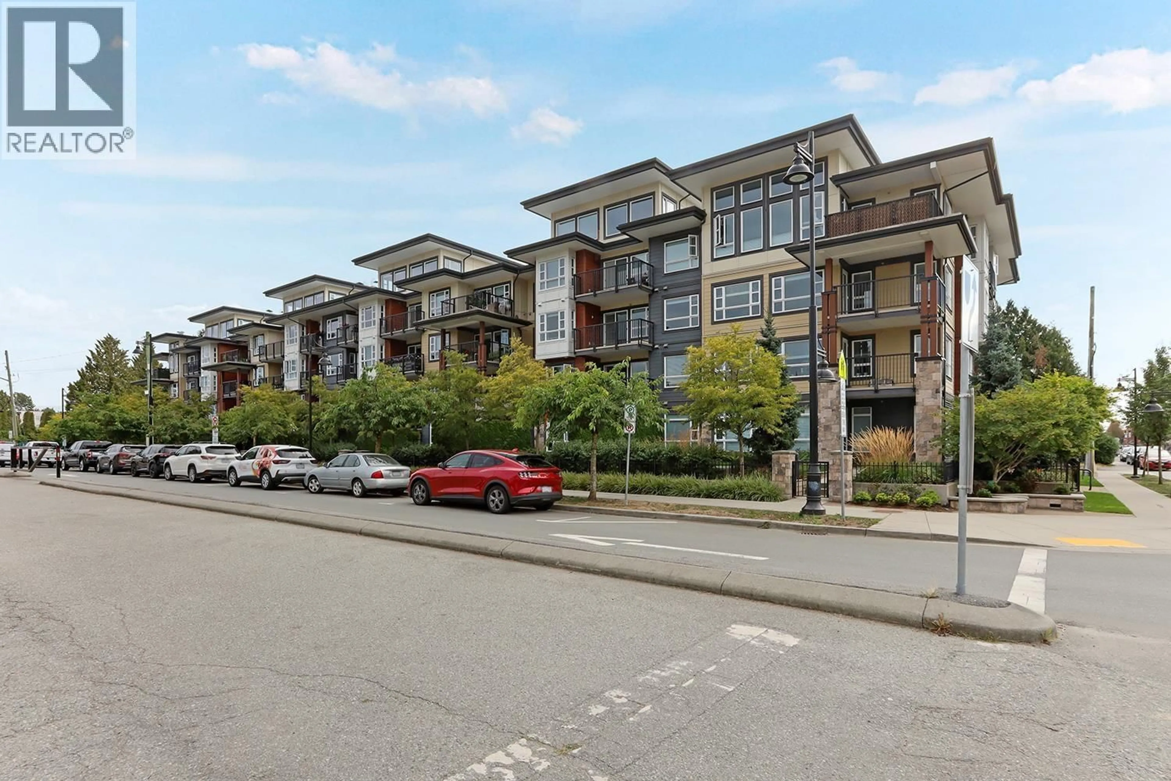 A pic from outside/outdoor area/front of a property/back of a property/a pic from drone, street for 304 - 22562 121 AVENUE, Maple Ridge British Columbia V2X3Y8