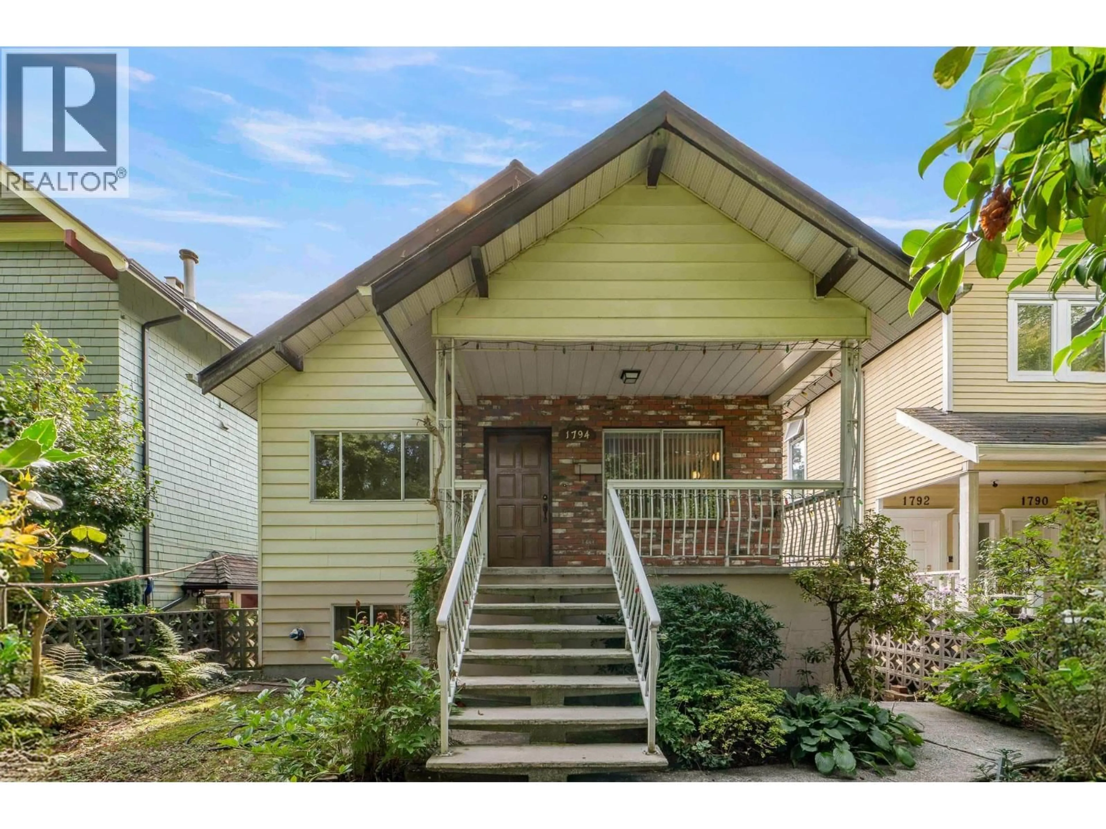 Home with vinyl exterior material, street for 1794 6TH AVENUE, Vancouver British Columbia V5N1P5