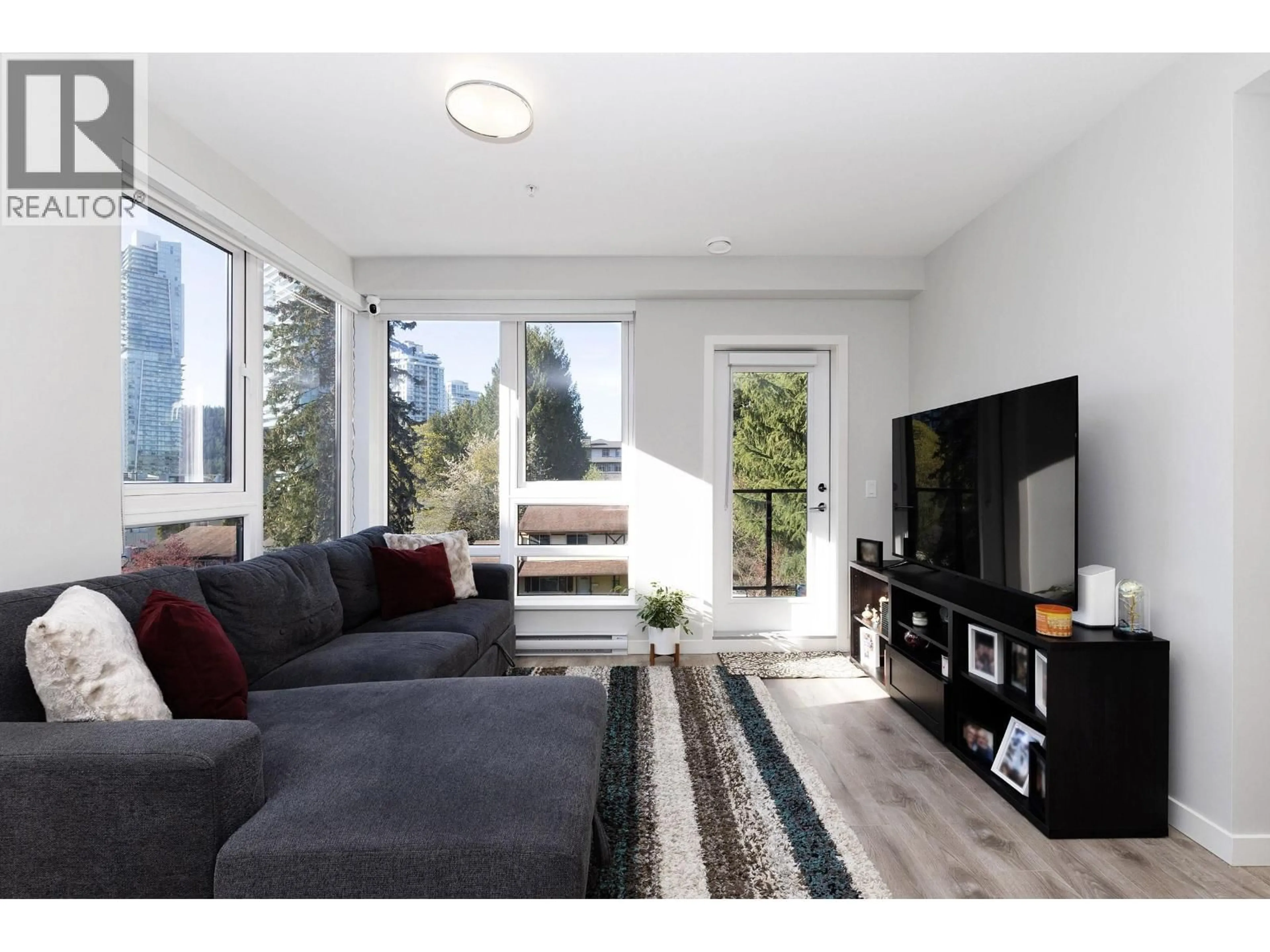 Living room with furniture, unknown for 404 - 615 COTTONWOOD AVENUE, Coquitlam British Columbia V3J2S5