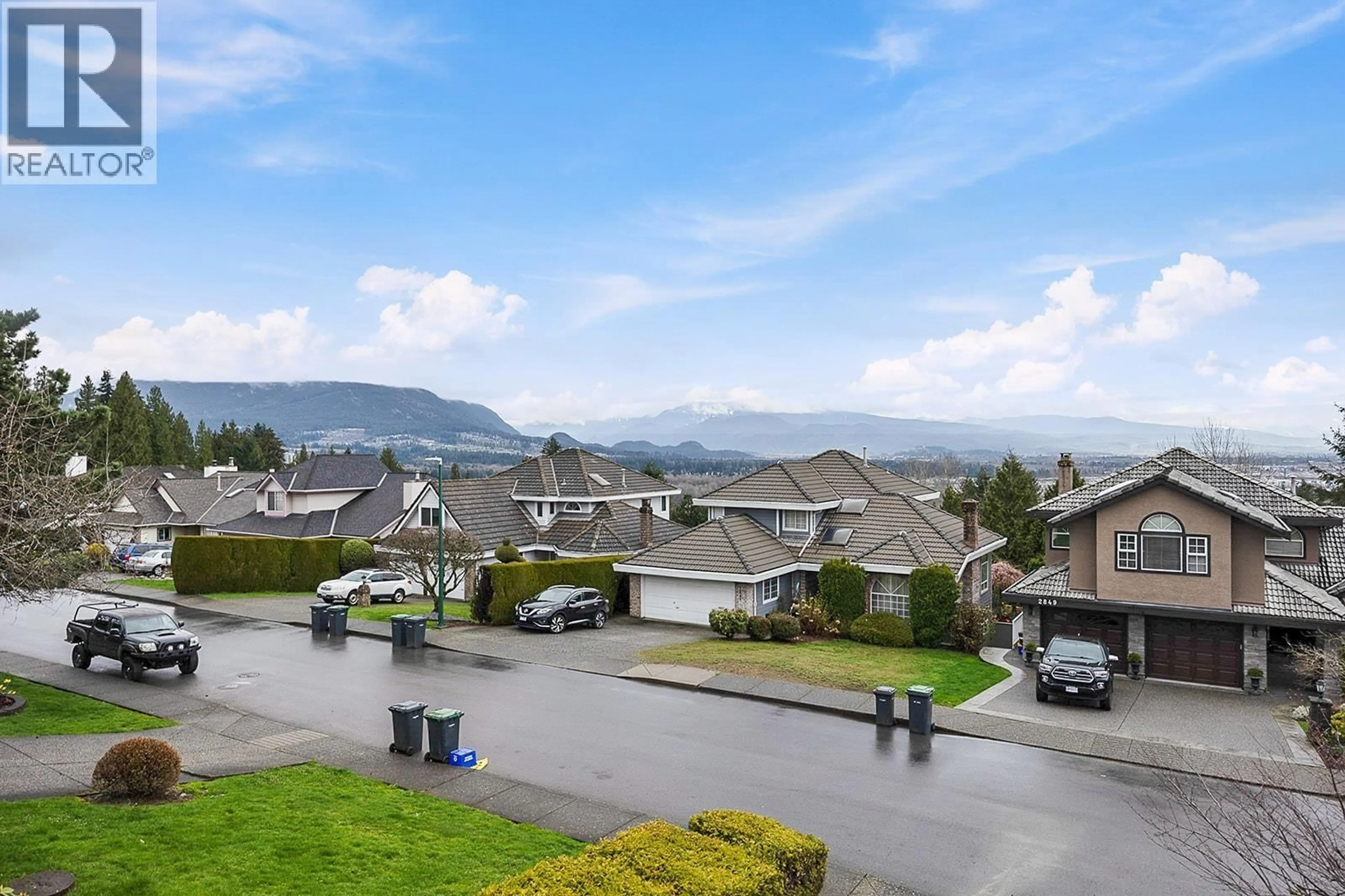 A pic from outside/outdoor area/front of a property/back of a property/a pic from drone, mountain view for 2850 MARA DRIVE, Coquitlam British Columbia V3C5L2