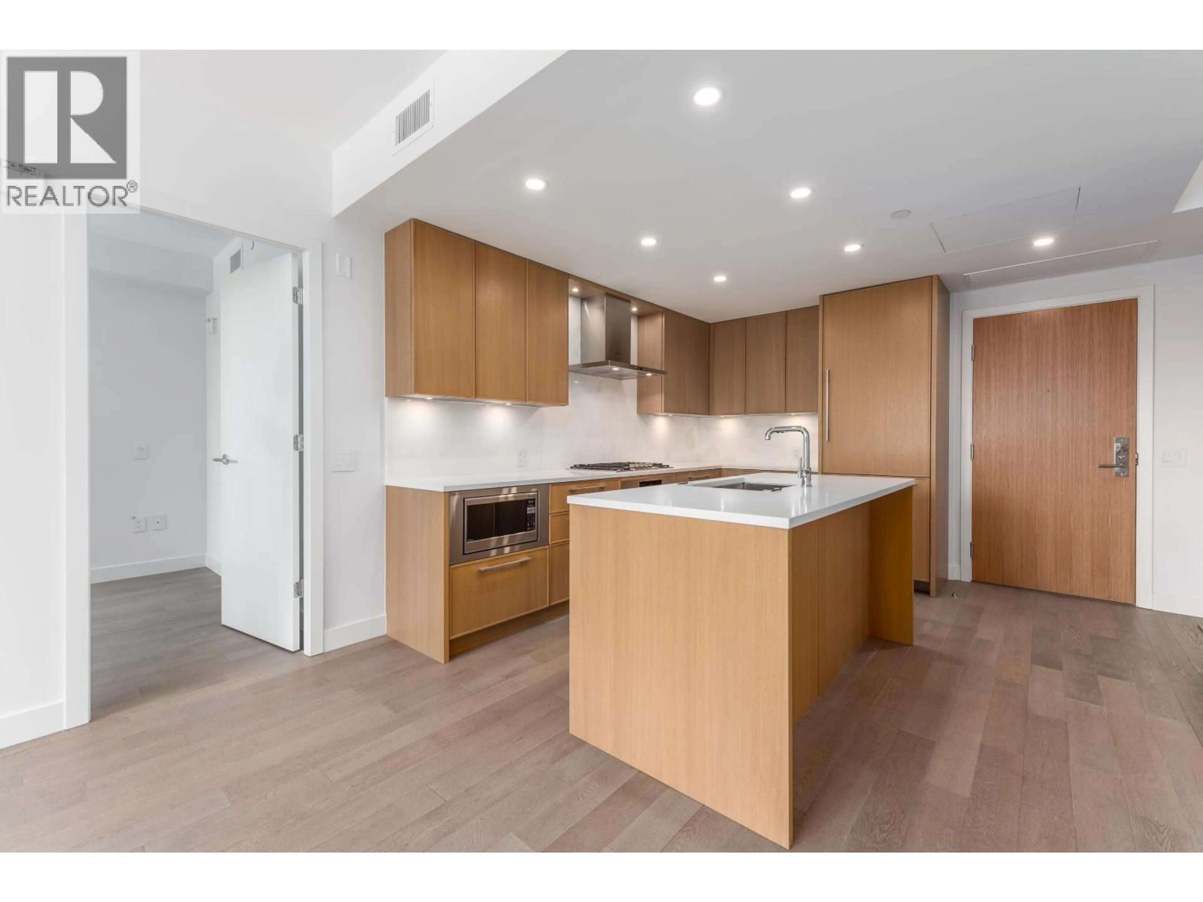 Open concept kitchen, unknown for 317 - 3220 CONNAUGHT CRESCENT, North Vancouver British Columbia V7T2P9