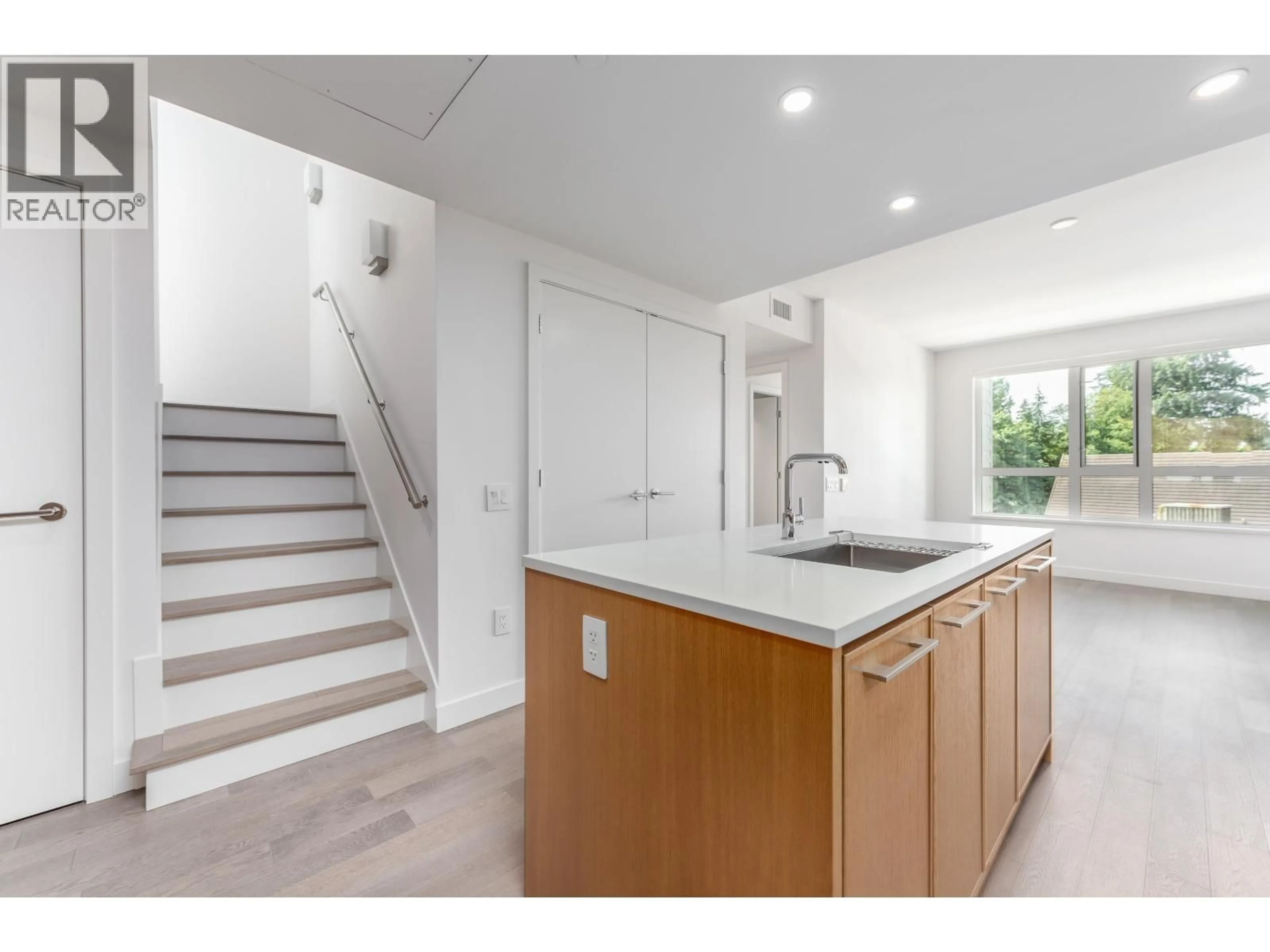 Open concept kitchen, unknown for 317 - 3220 CONNAUGHT CRESCENT, North Vancouver British Columbia V7T2P9