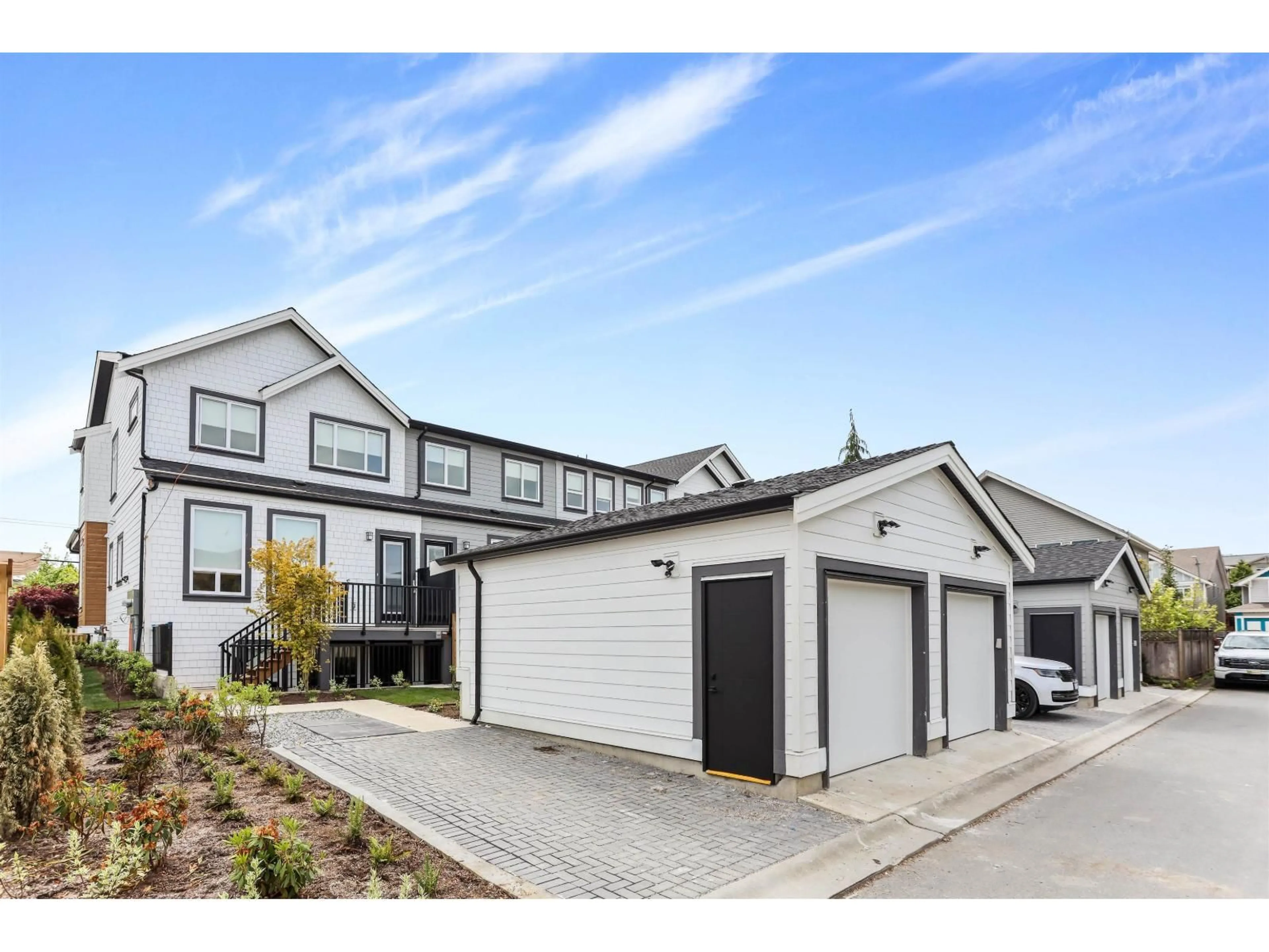 Home with vinyl exterior material, street for 20963 83, Surrey British Columbia V2Y4K4