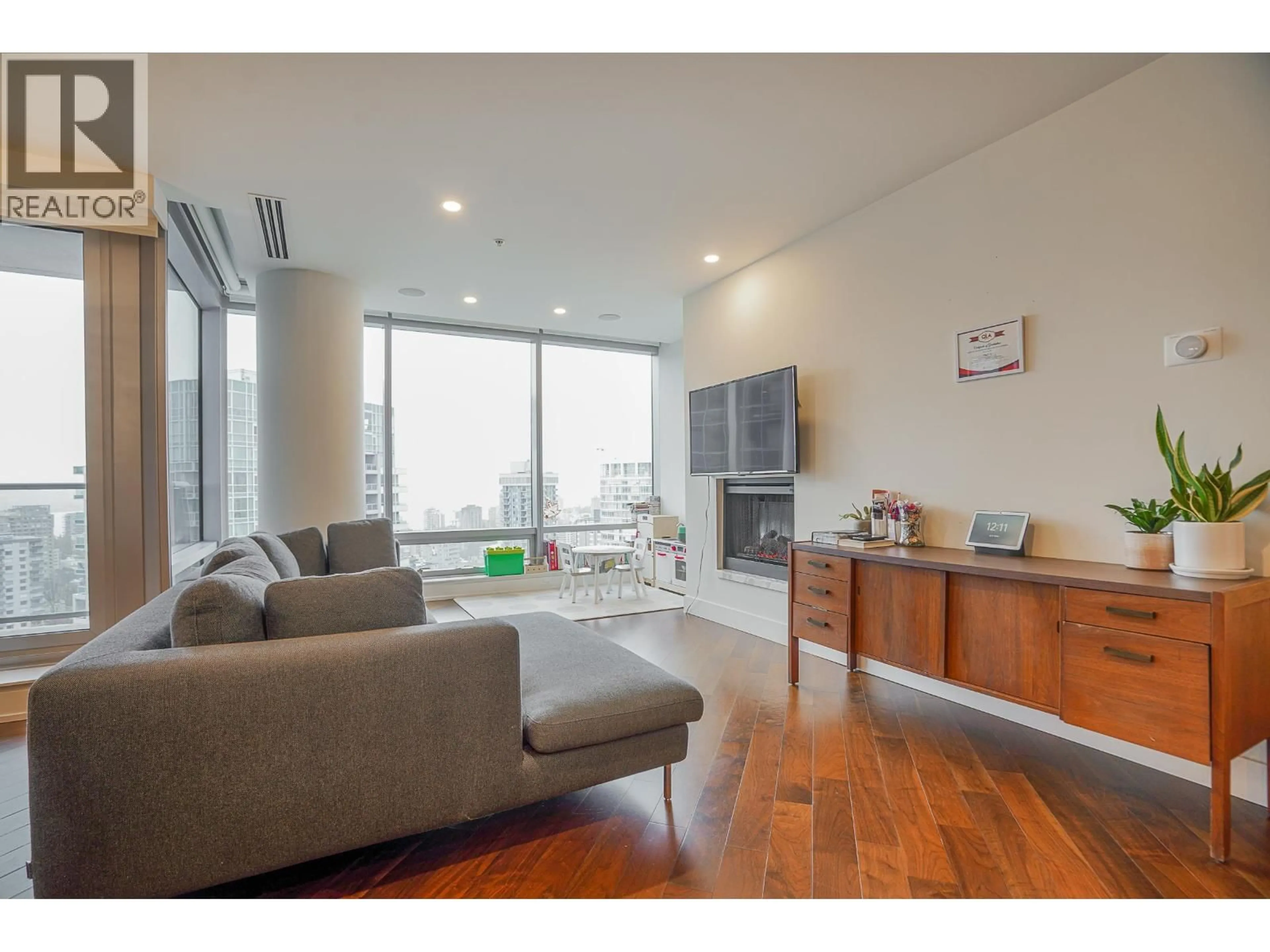 Living room with furniture, wood/laminate floor for 3001 - 1111 ALBERNI STREET, Vancouver British Columbia V6E4V2