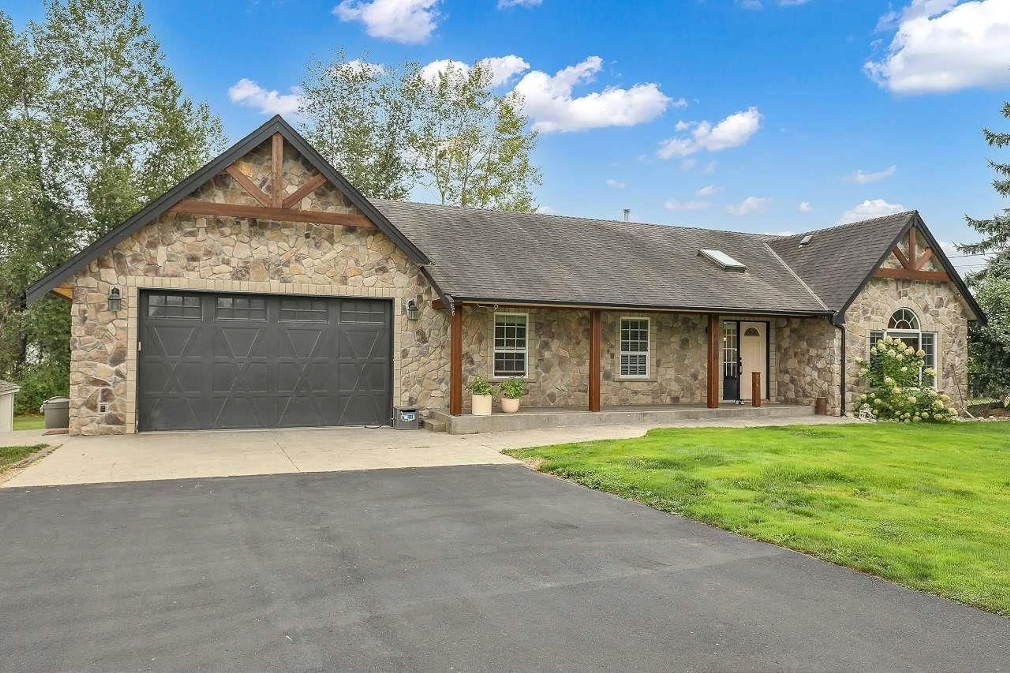 Home with brick exterior material, street for 6650 258, Langley British Columbia V4W1V3