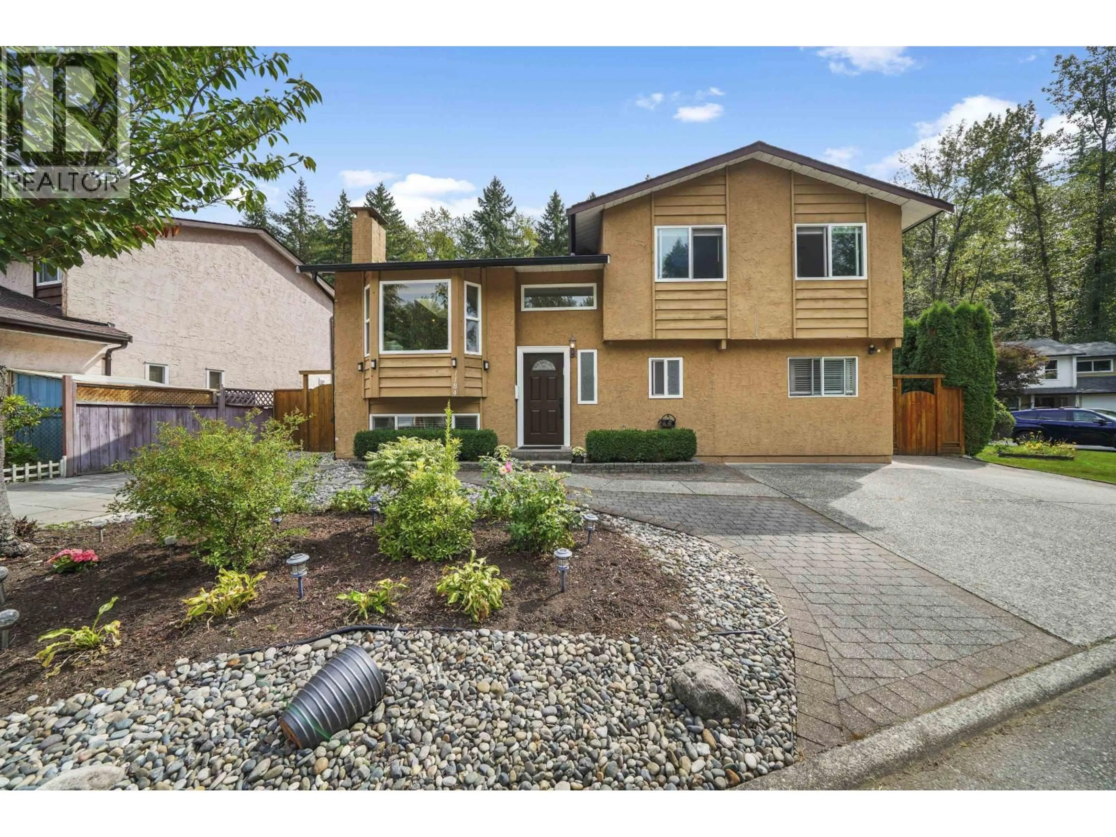 Home with vinyl exterior material, street for 1184 PARKLAND DRIVE, Coquitlam British Columbia V3E1M2