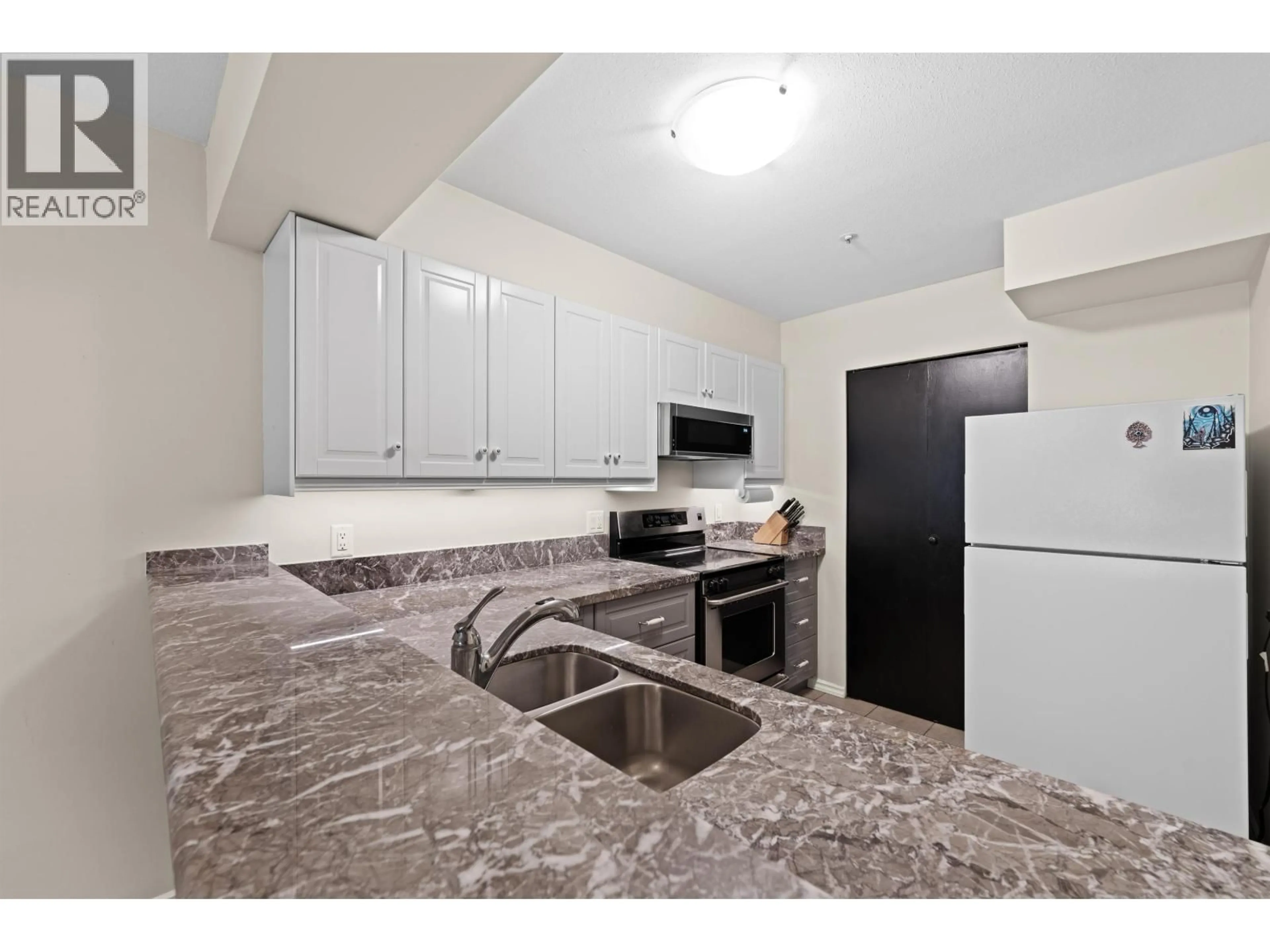 Standard kitchen, ceramic/tile floor for 101 - 1615 FRANCES STREET, Vancouver British Columbia V5L1Z3