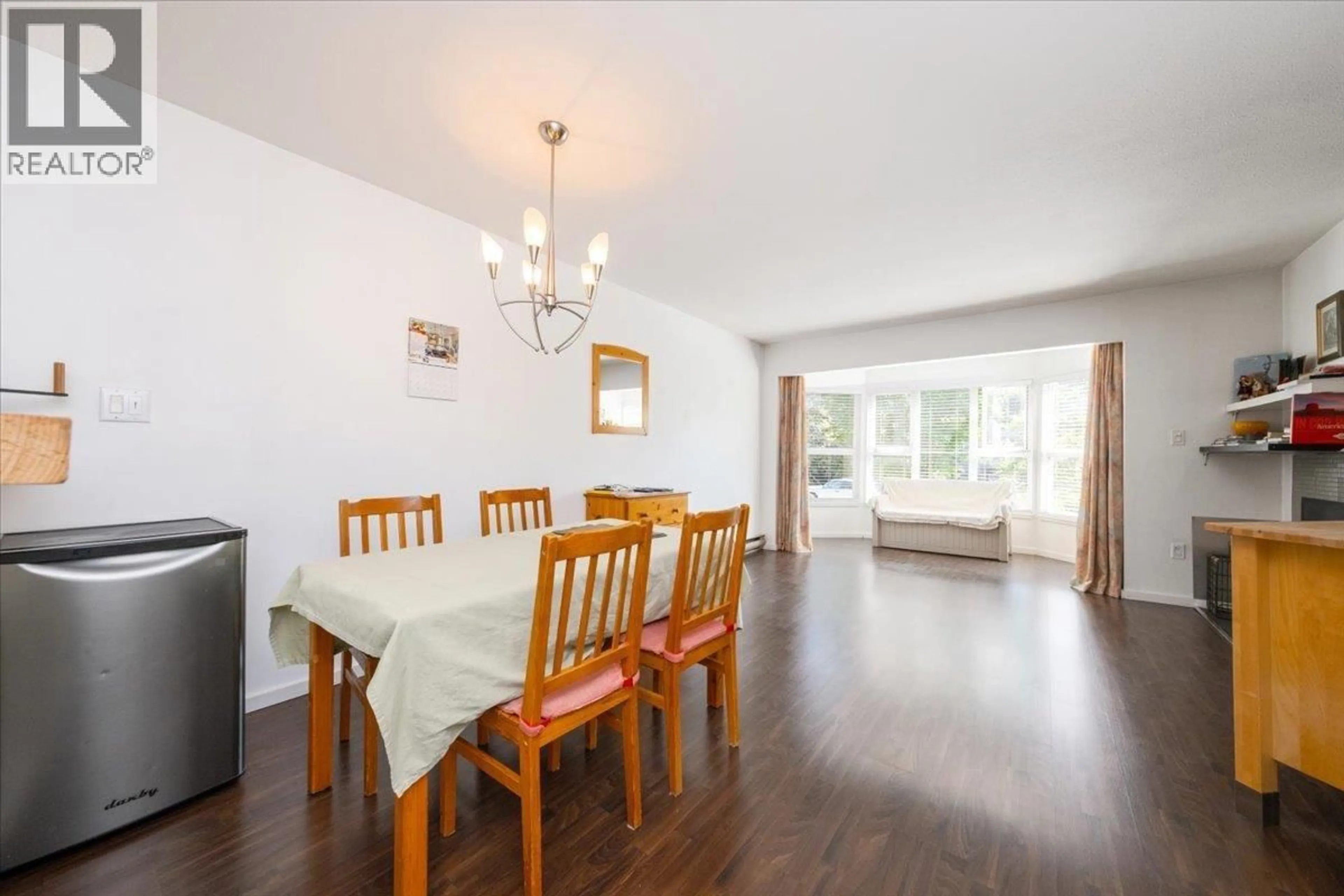 Dining room, wood/laminate floor for 206 - 2255 ETON STREET, Vancouver British Columbia V5L1C9