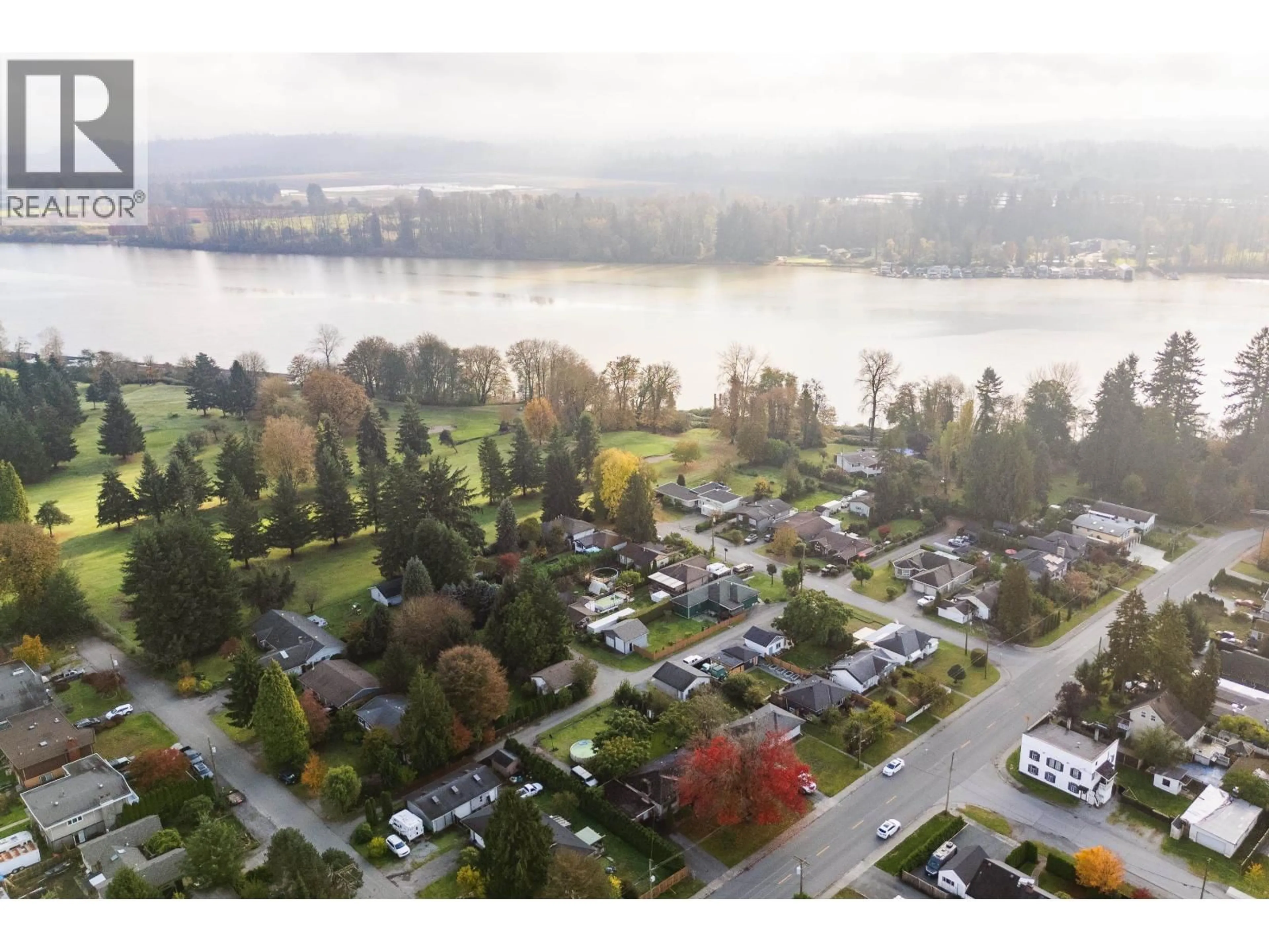 A pic from outside/outdoor area/front of a property/back of a property/a pic from drone, water/lake/river/ocean view for 11312 207 STREET, Maple Ridge British Columbia V2X1W3