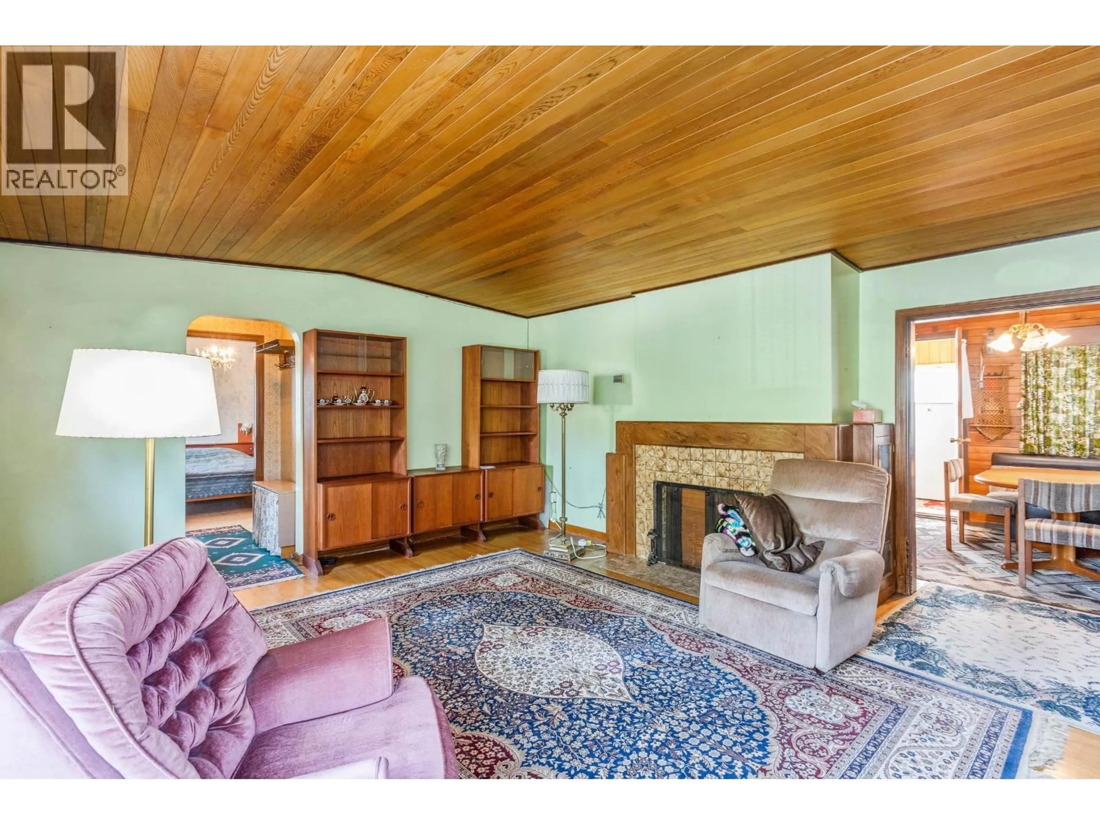 Living room with furniture, wood/laminate floor for 5670 COLUMBIA STREET, Vancouver British Columbia V5Y3H7