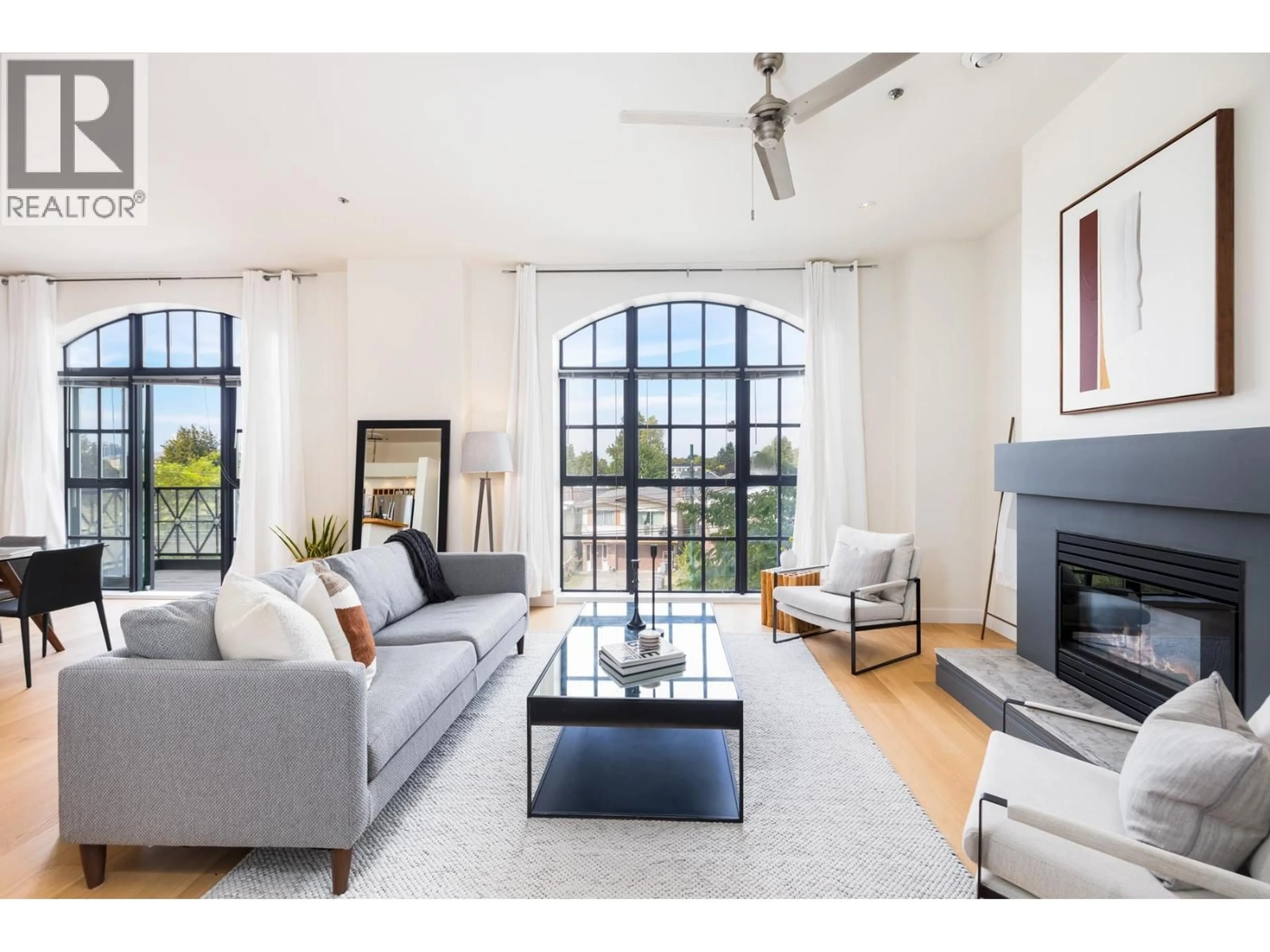 Living room with furniture, unknown for 202 - 4590 EARLES STREET, Vancouver British Columbia V5R6A2