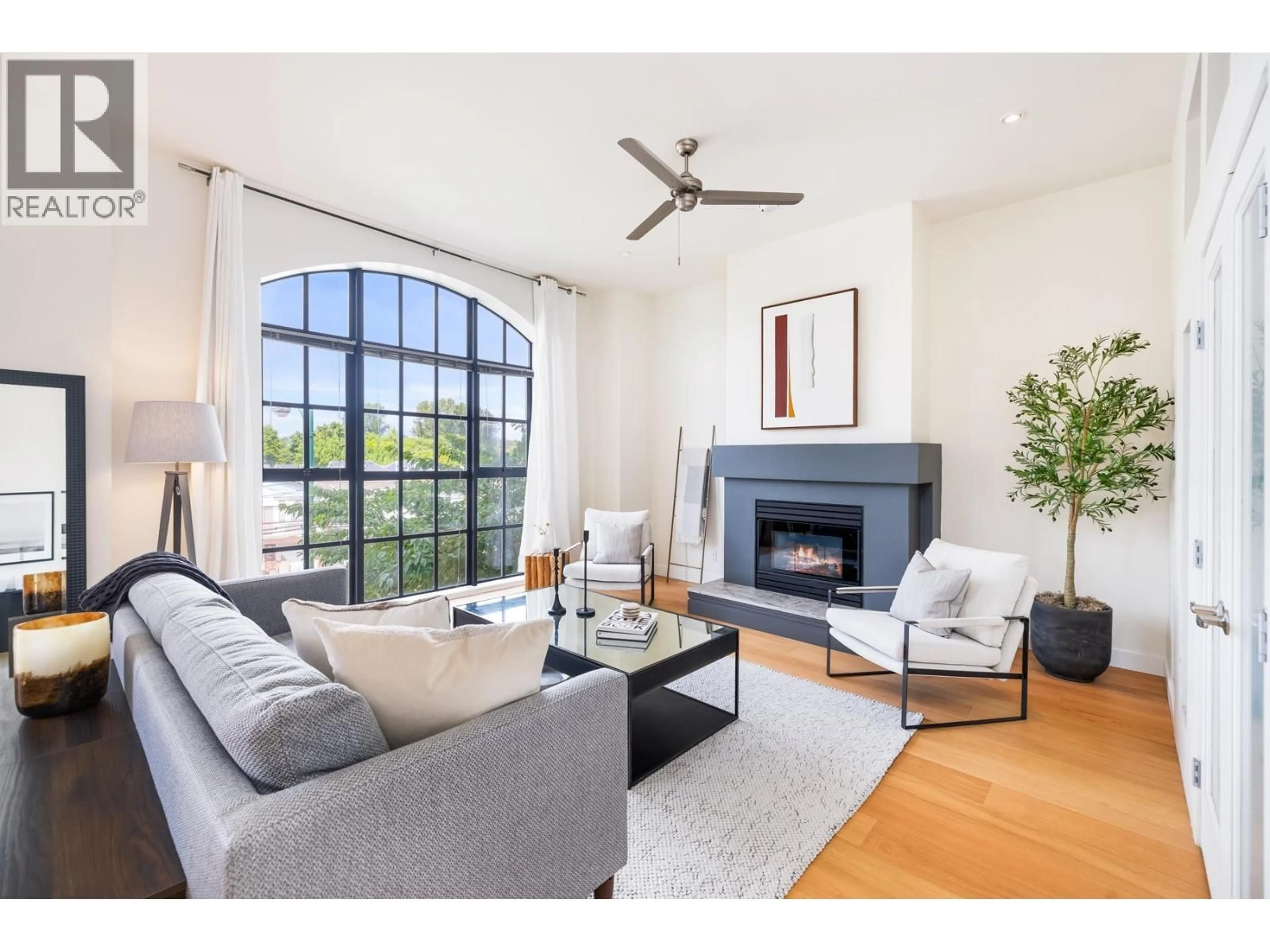Living room with furniture, unknown for 202 - 4590 EARLES STREET, Vancouver British Columbia V5R6A2