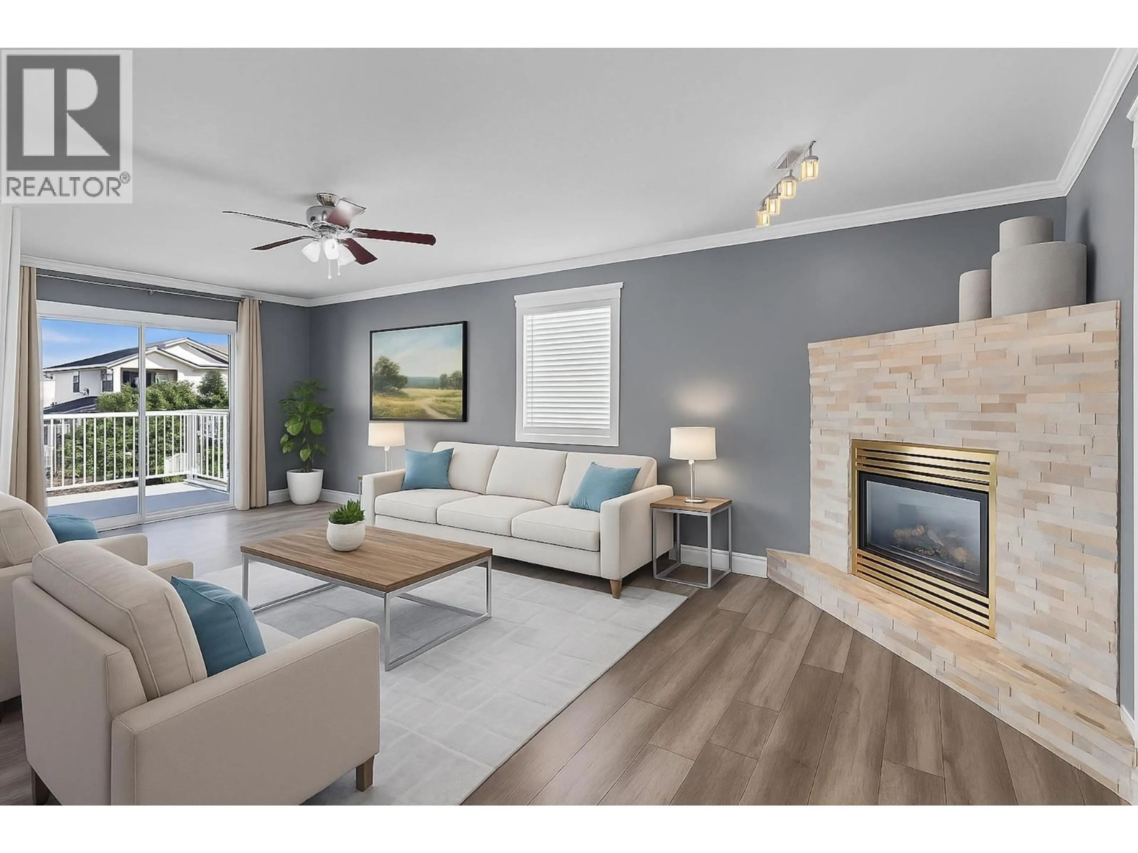 Living room with furniture, wood/laminate floor for 2764 MERRITT ROAD, Prince George British Columbia V2N1M4