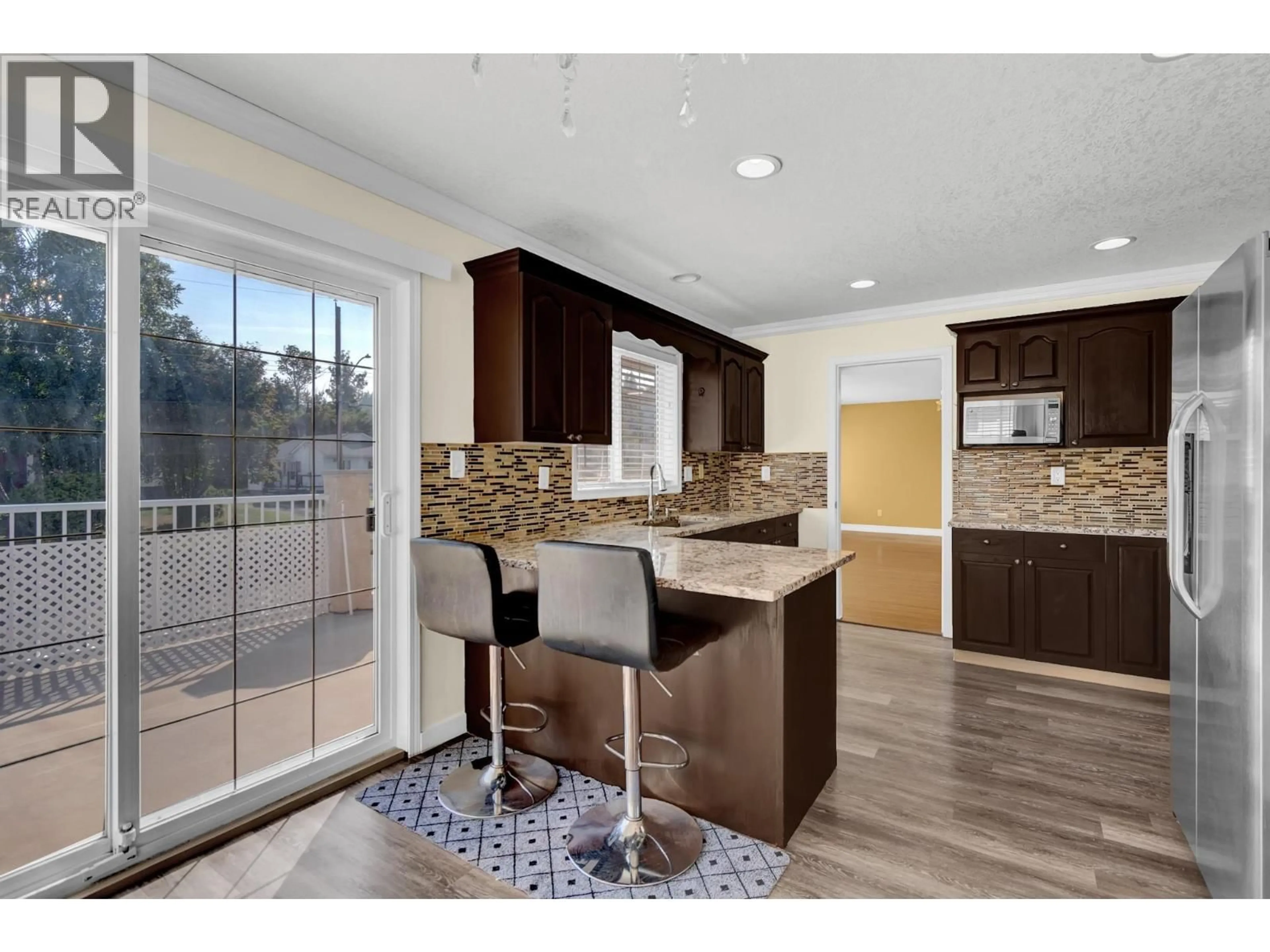 Open concept kitchen, ceramic/tile floor for 2764 MERRITT ROAD, Prince George British Columbia V2N1M4