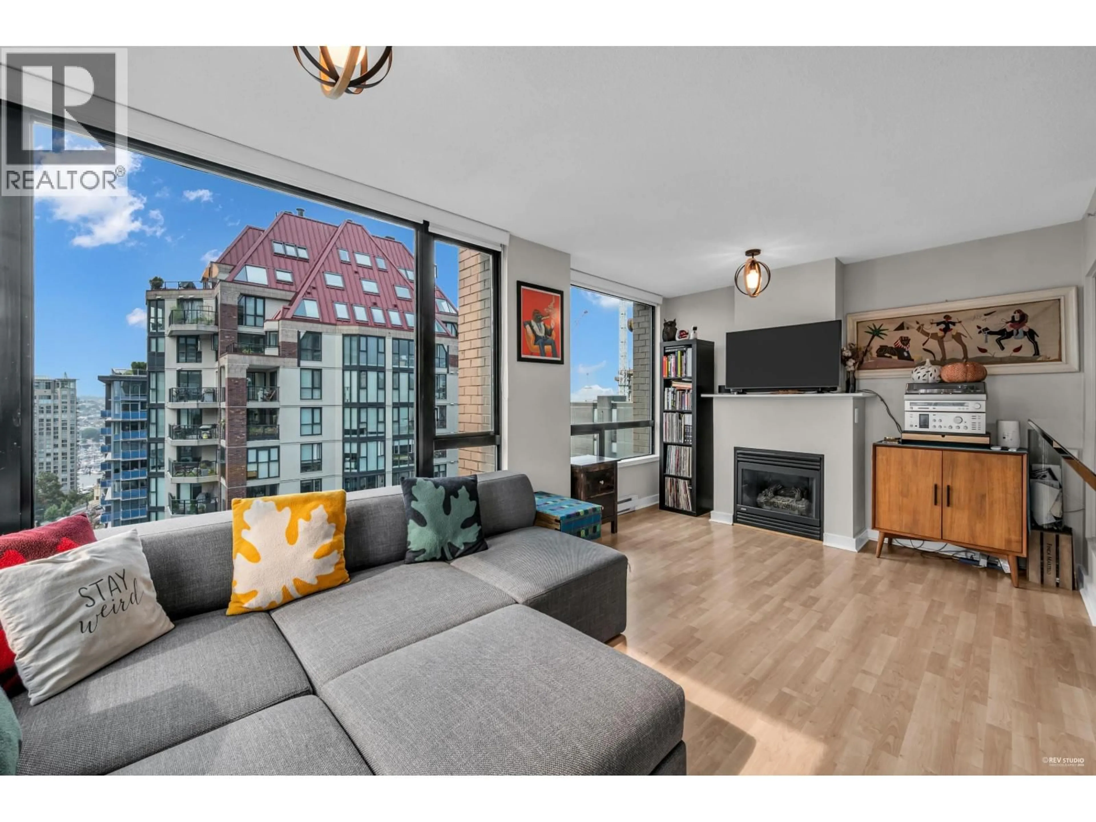 Living room with furniture, wood/laminate floor for 1504 - 1003 BURNABY STREET, Vancouver British Columbia V6E4R7