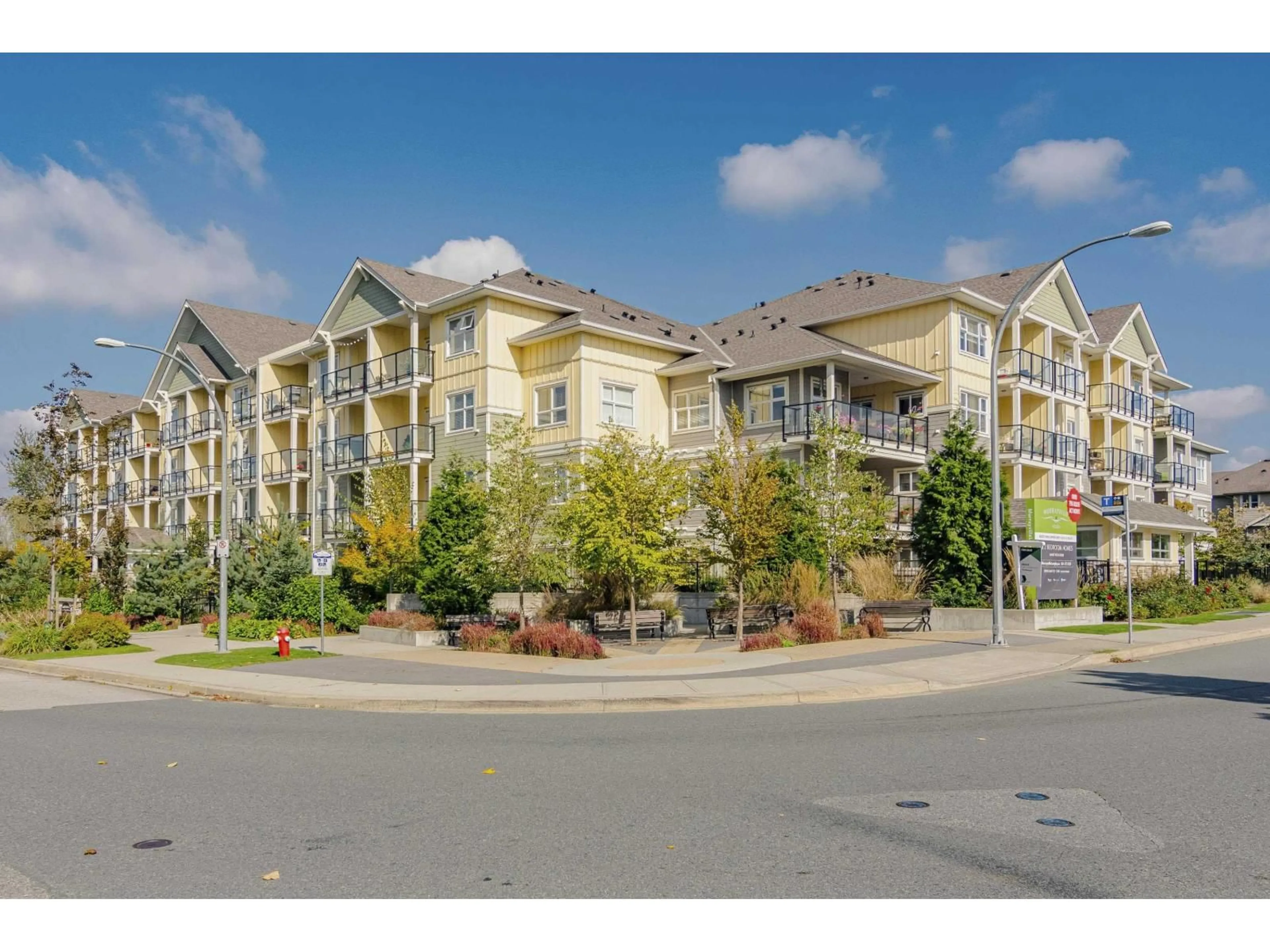 A pic from outside/outdoor area/front of a property/back of a property/a pic from drone, mountain view for 305 - 5020 221A, Langley British Columbia V2Y0V5