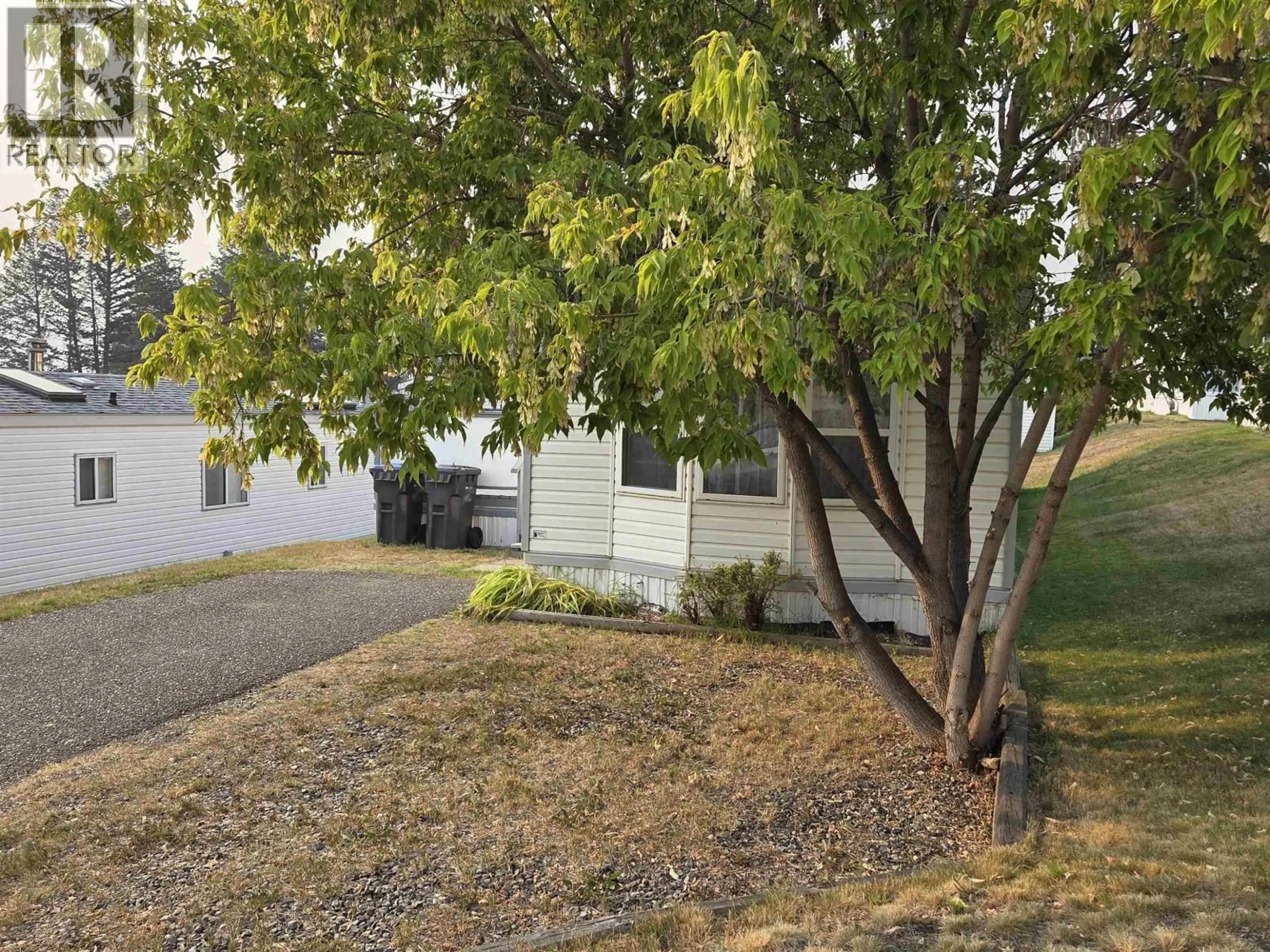 A pic from outside/outdoor area/front of a property/back of a property/a pic from drone, street for 92 - 770 11TH AVENUE, Williams Lake British Columbia V2G2M4