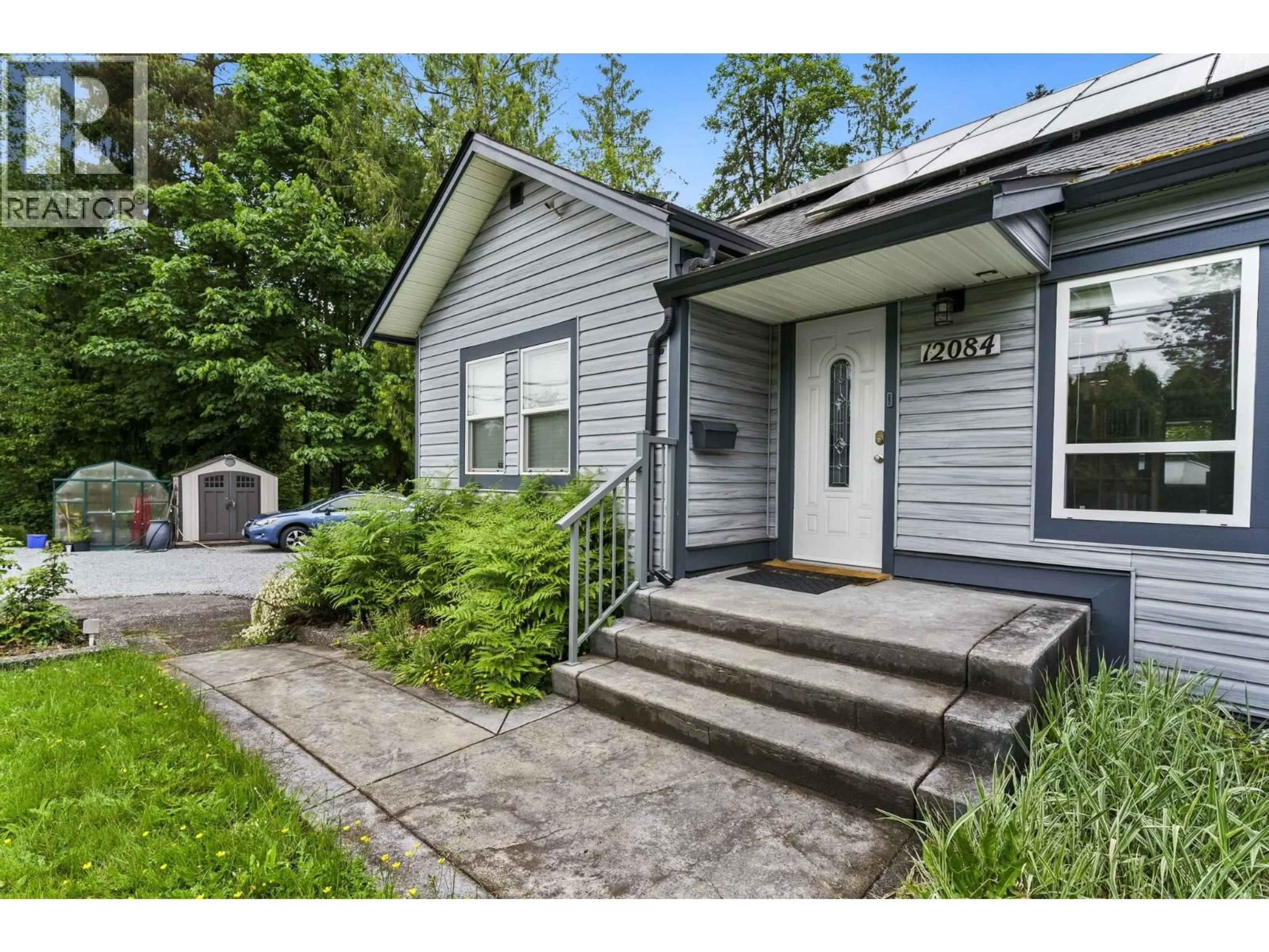 Home with vinyl exterior material, street for 12084 232ND STREET, Maple Ridge British Columbia V2X6T3