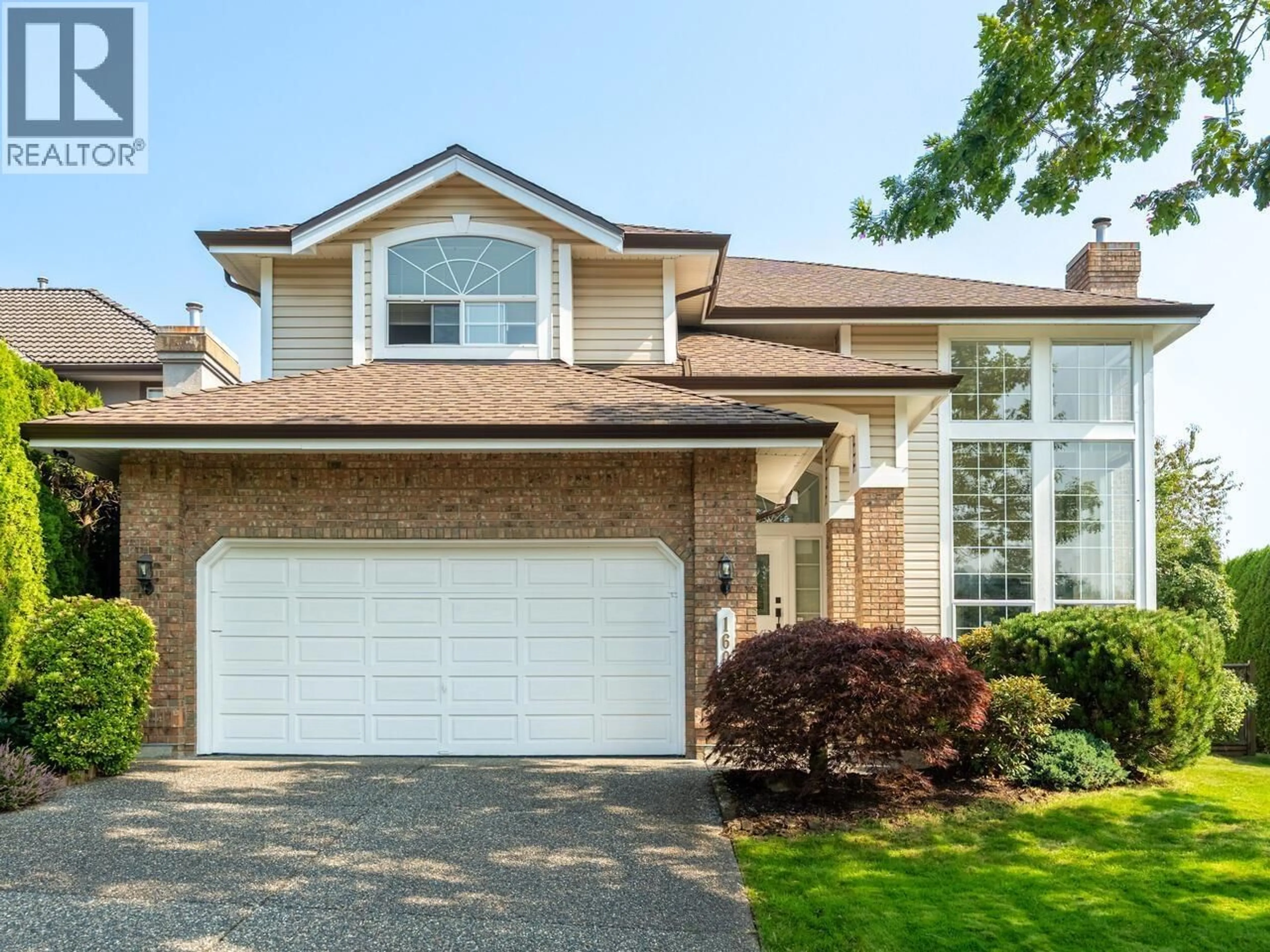 Home with brick exterior material, street for 1603 SUNDEW PLACE, Coquitlam British Columbia V3E2Y4