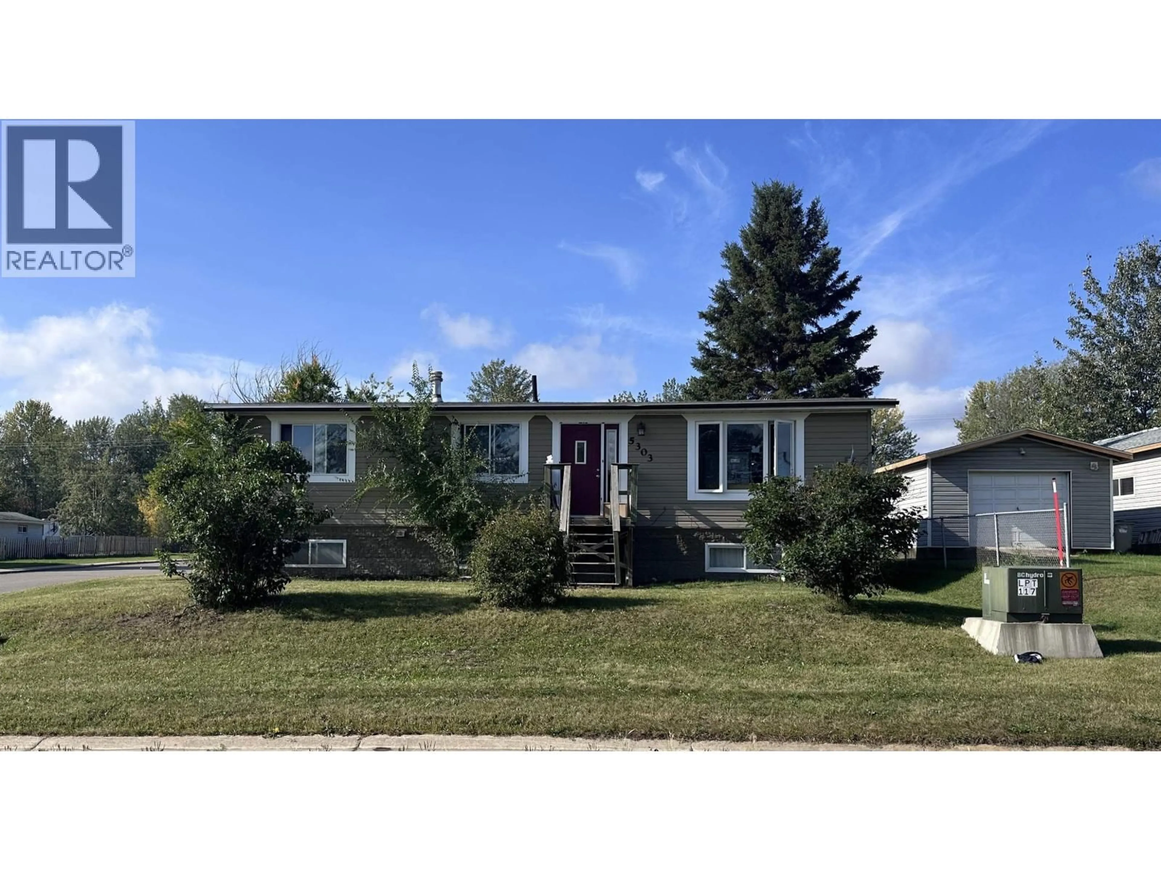 Home with vinyl exterior material, street for 5303 41 STREET, Fort Nelson British Columbia V0C1R0
