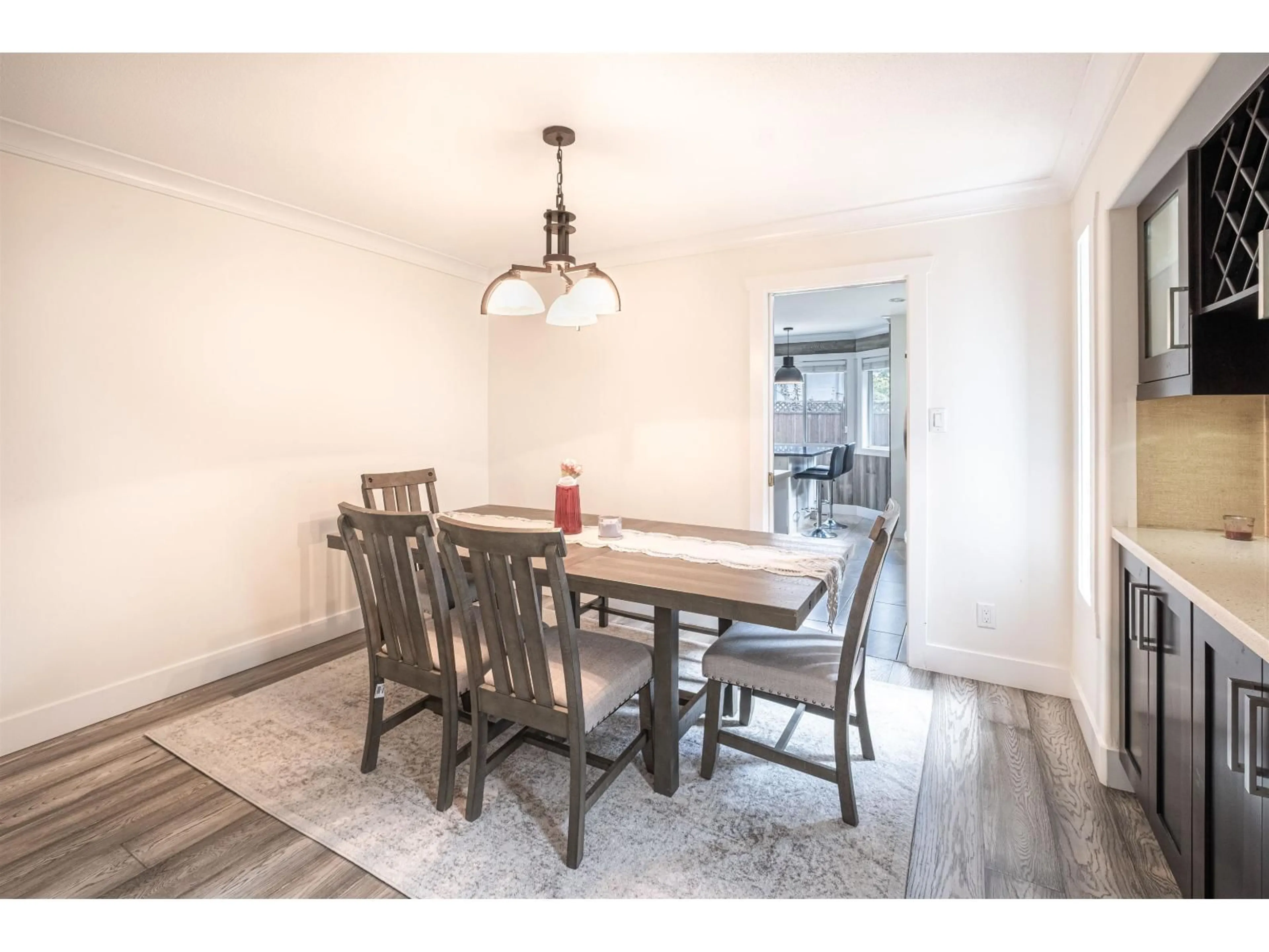 Dining room, wood/laminate floor for 13698 58, Surrey British Columbia V3X3H9