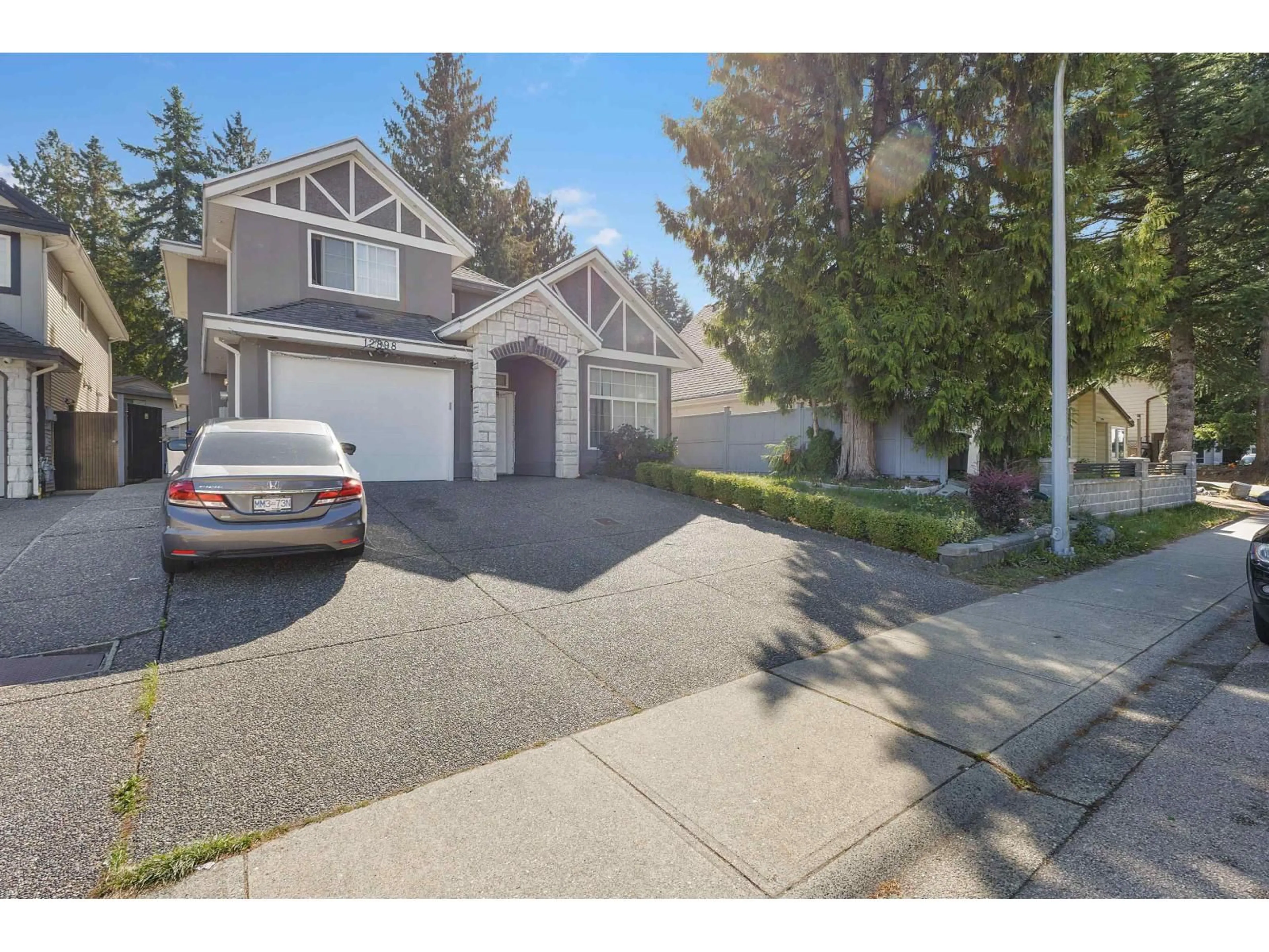 A pic from outside/outdoor area/front of a property/back of a property/a pic from drone, street for 12898 68, Surrey British Columbia V3W7C2