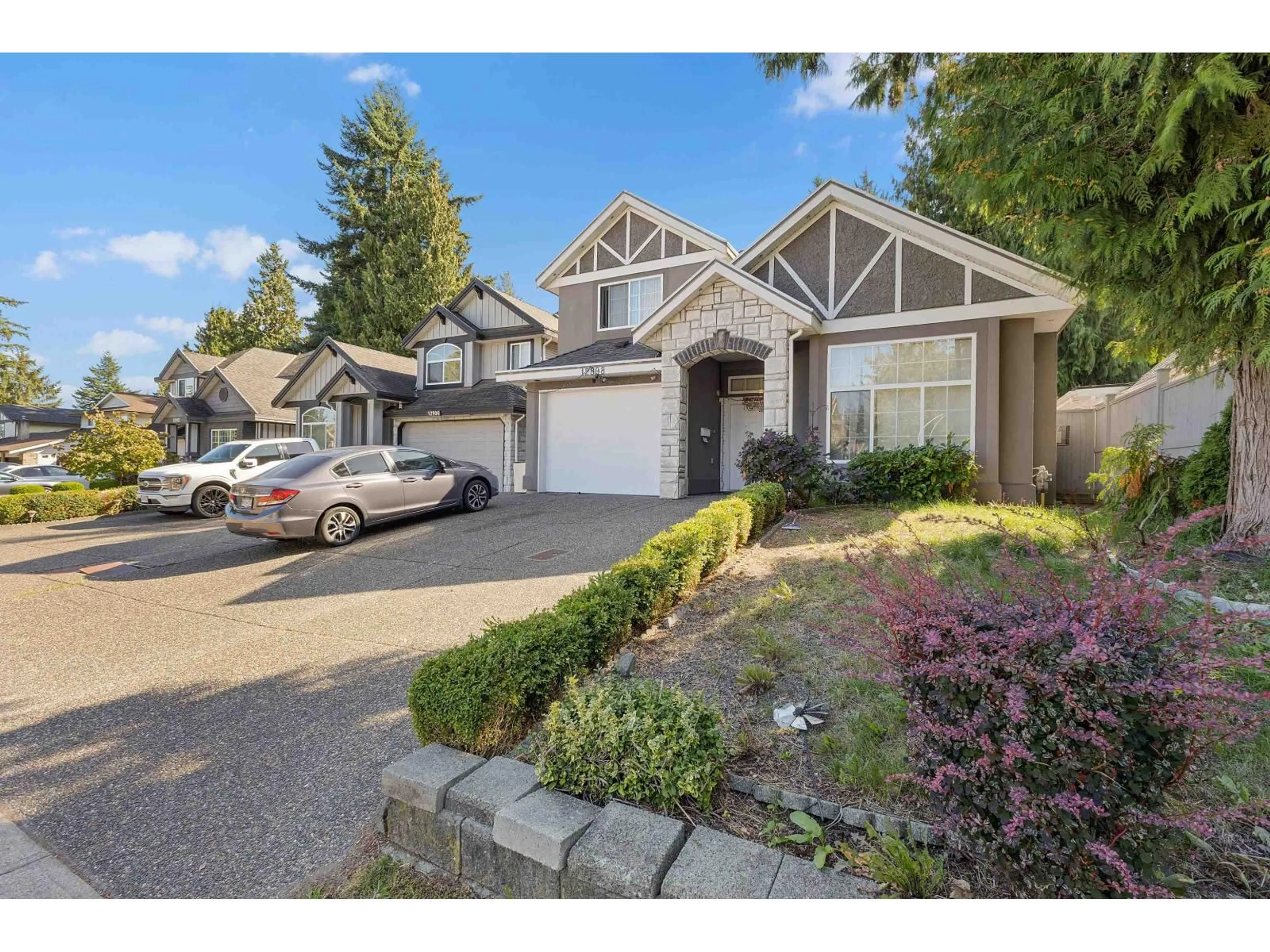 Home with vinyl exterior material, street for 12898 68, Surrey British Columbia V3W7C2