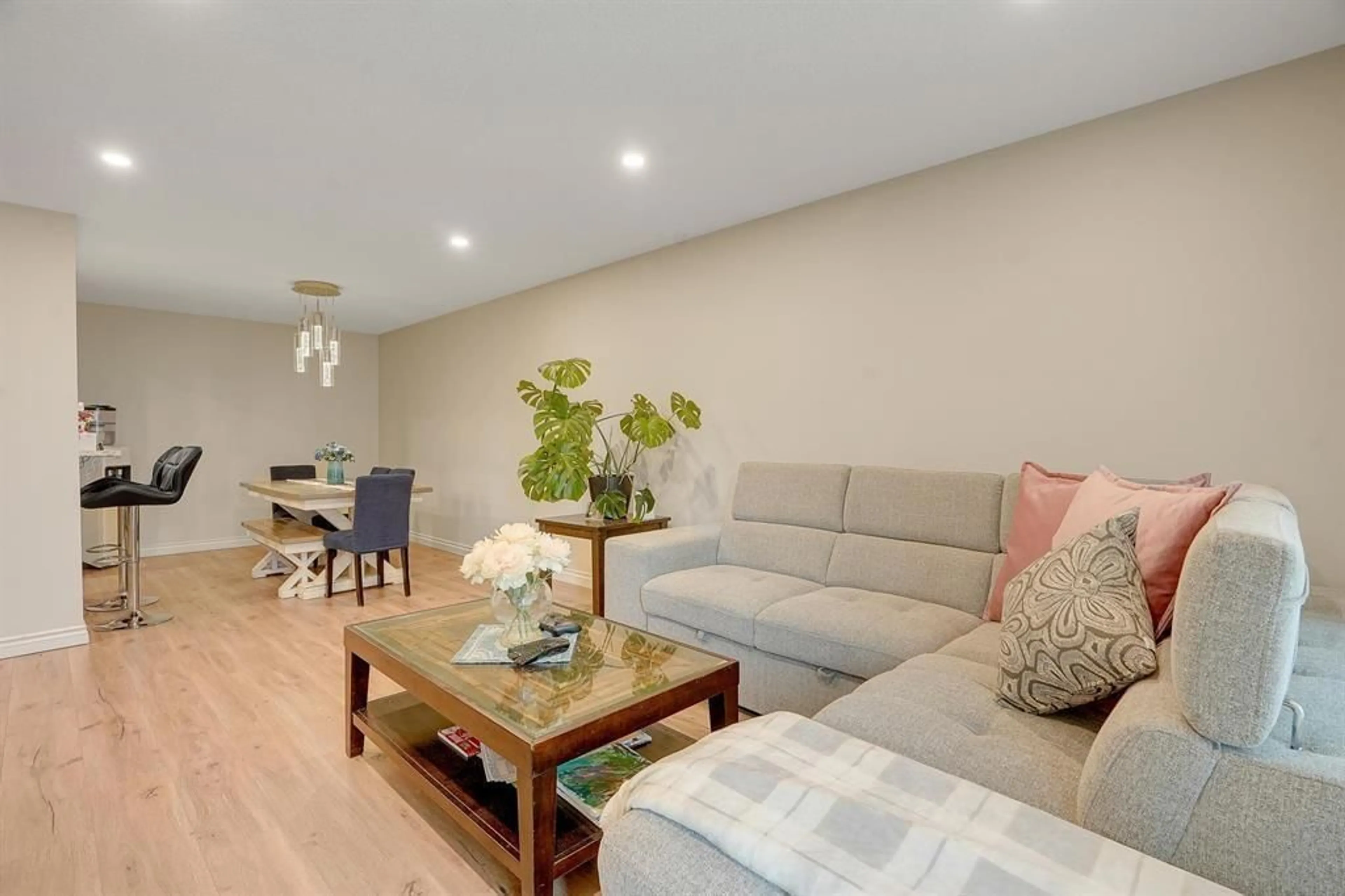 Living room with furniture, wood/laminate floor for 121 - 32850 GEORGE FERGUSON, Abbotsford British Columbia V2S7K1