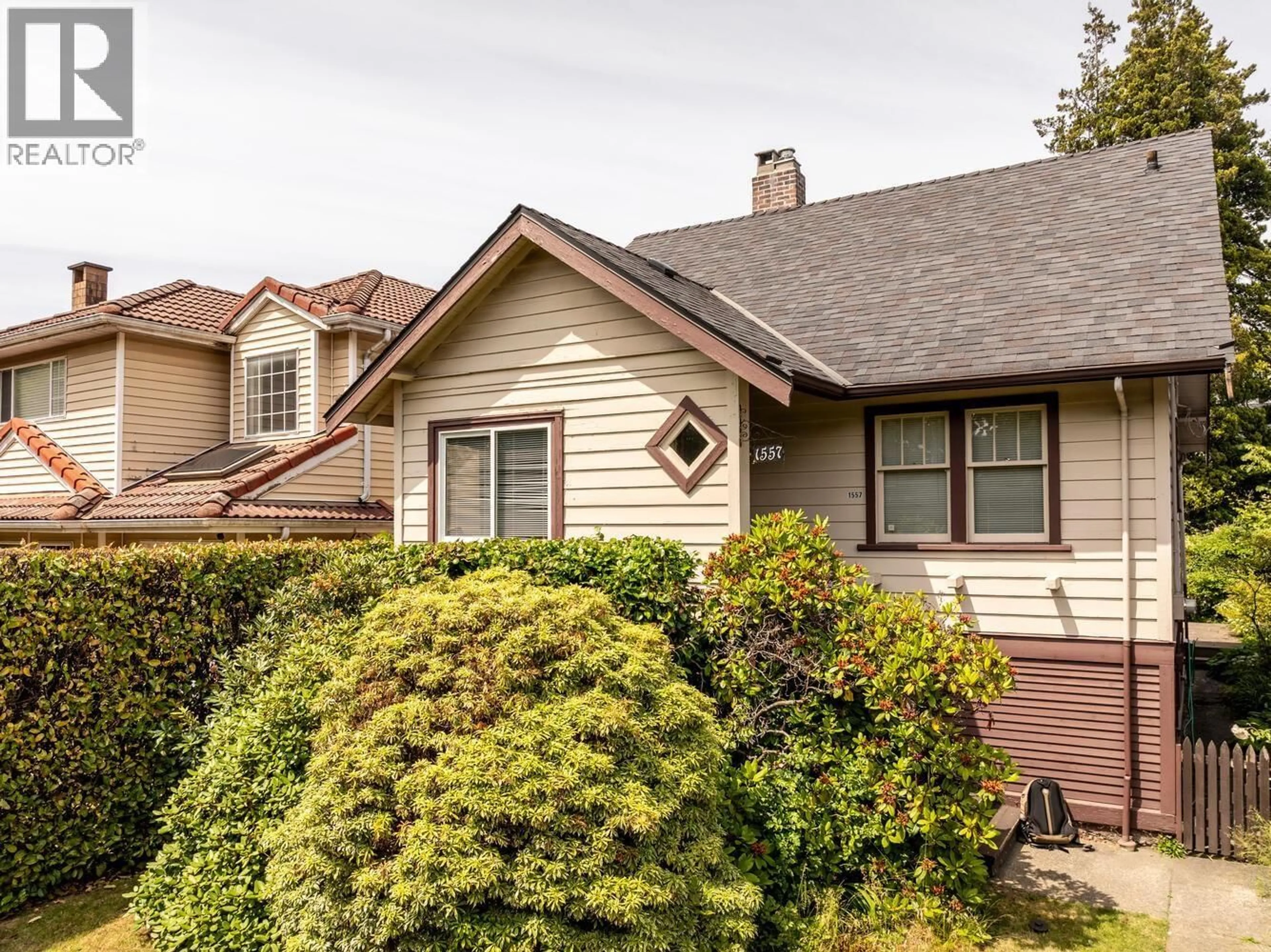 Home with vinyl exterior material, street for 1557 68TH AVENUE, Vancouver British Columbia V6P2V4