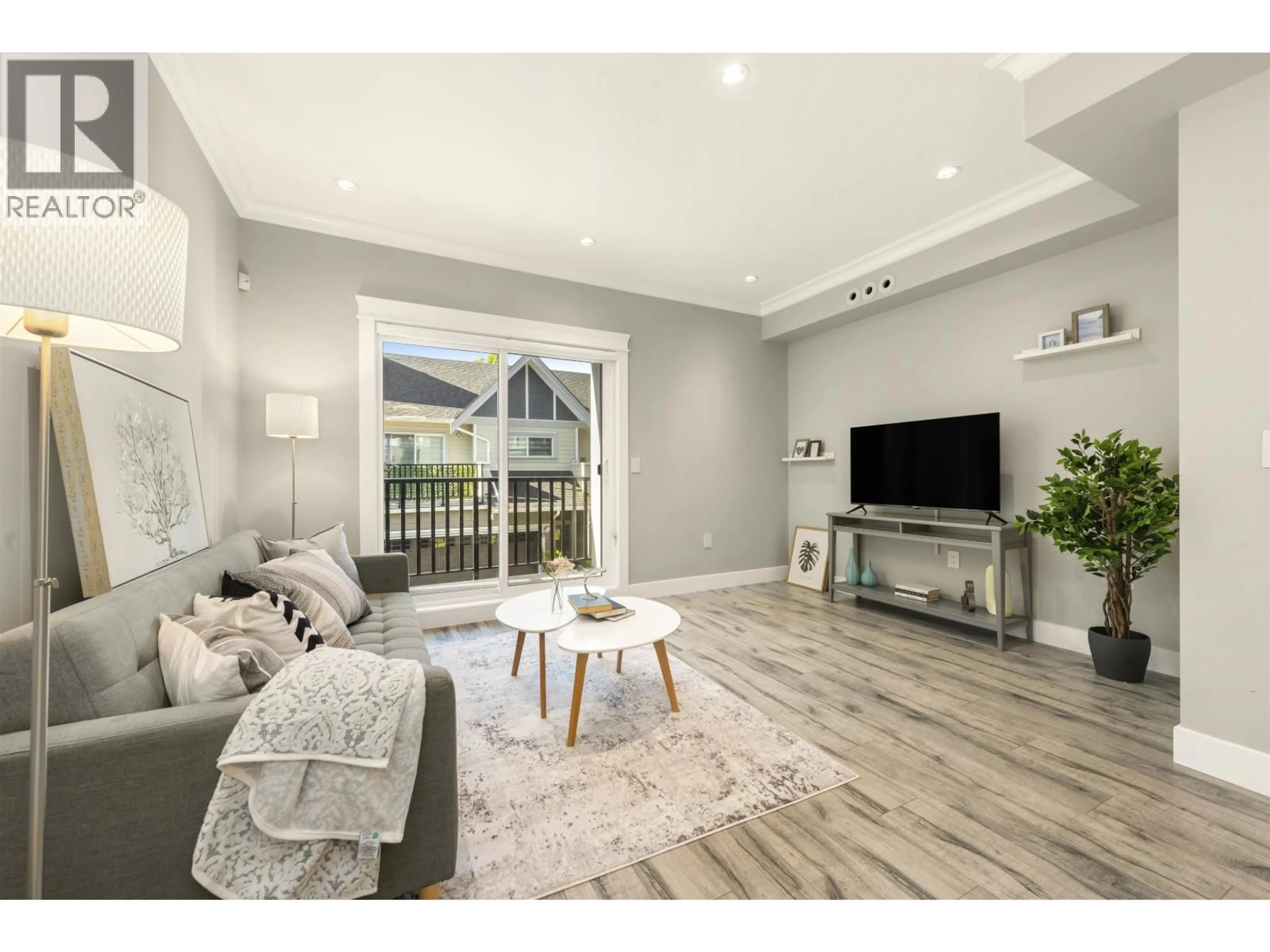 Living room with furniture, wood/laminate floor for 2 - 9728 ALBERTA ROAD, Richmond British Columbia V6Y0J2