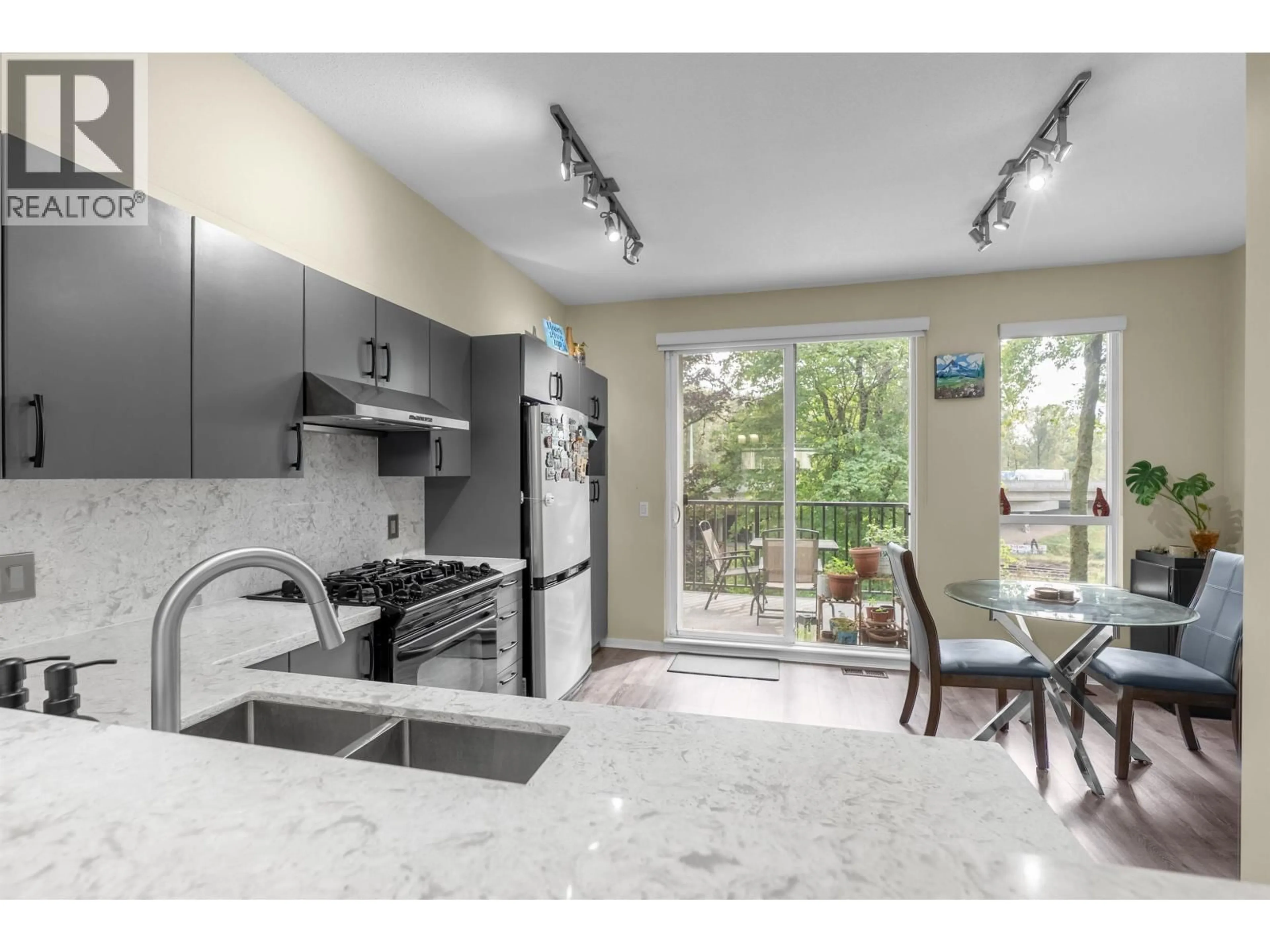 Open concept kitchen, ceramic/tile floor for 167 - 9133 GOVERNMENT STREET, Burnaby British Columbia V3N0B1