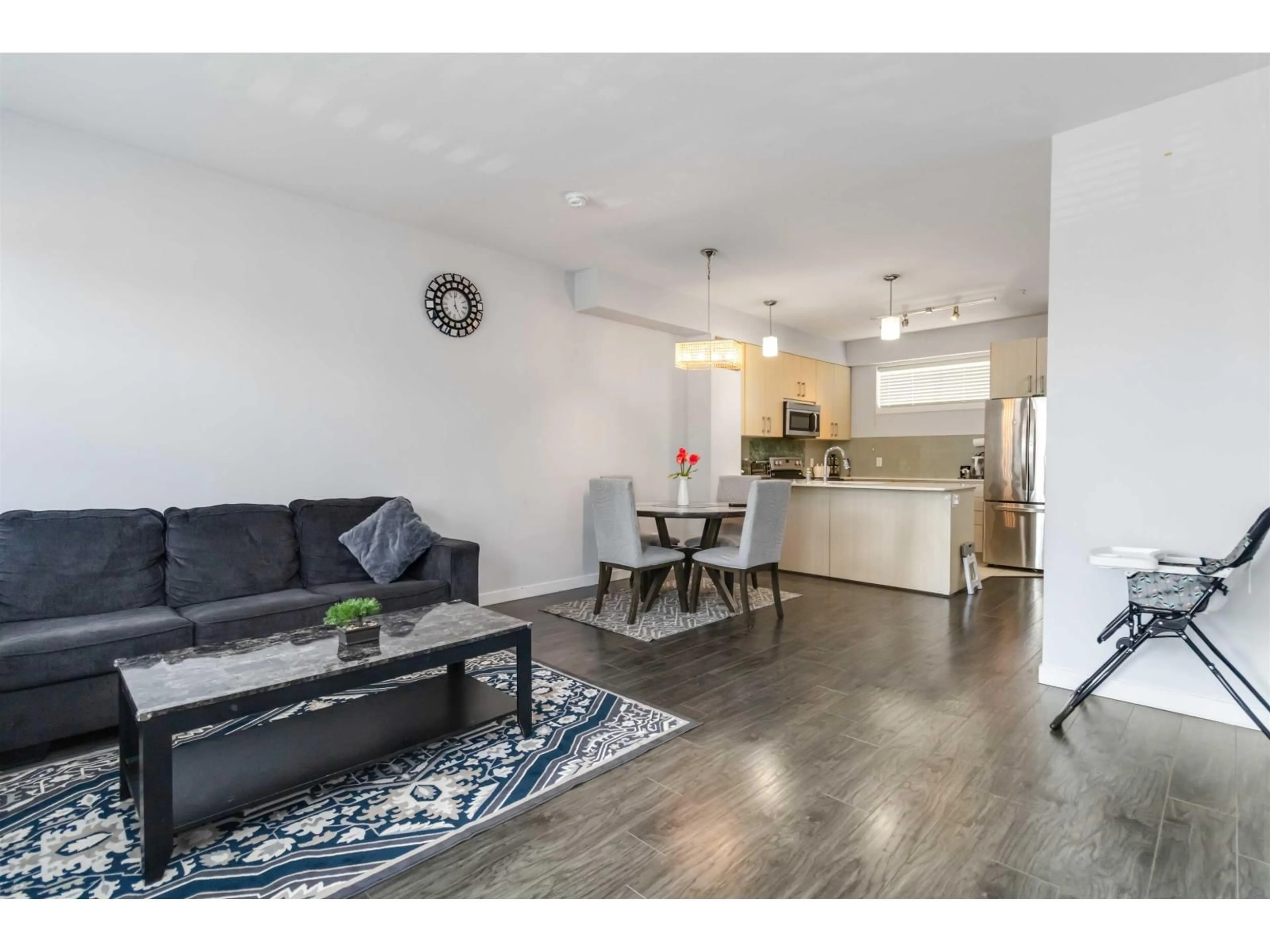 Living room with furniture, wood/laminate floor for 230 - 32095 HILLCREST, Abbotsford British Columbia V2T1S3