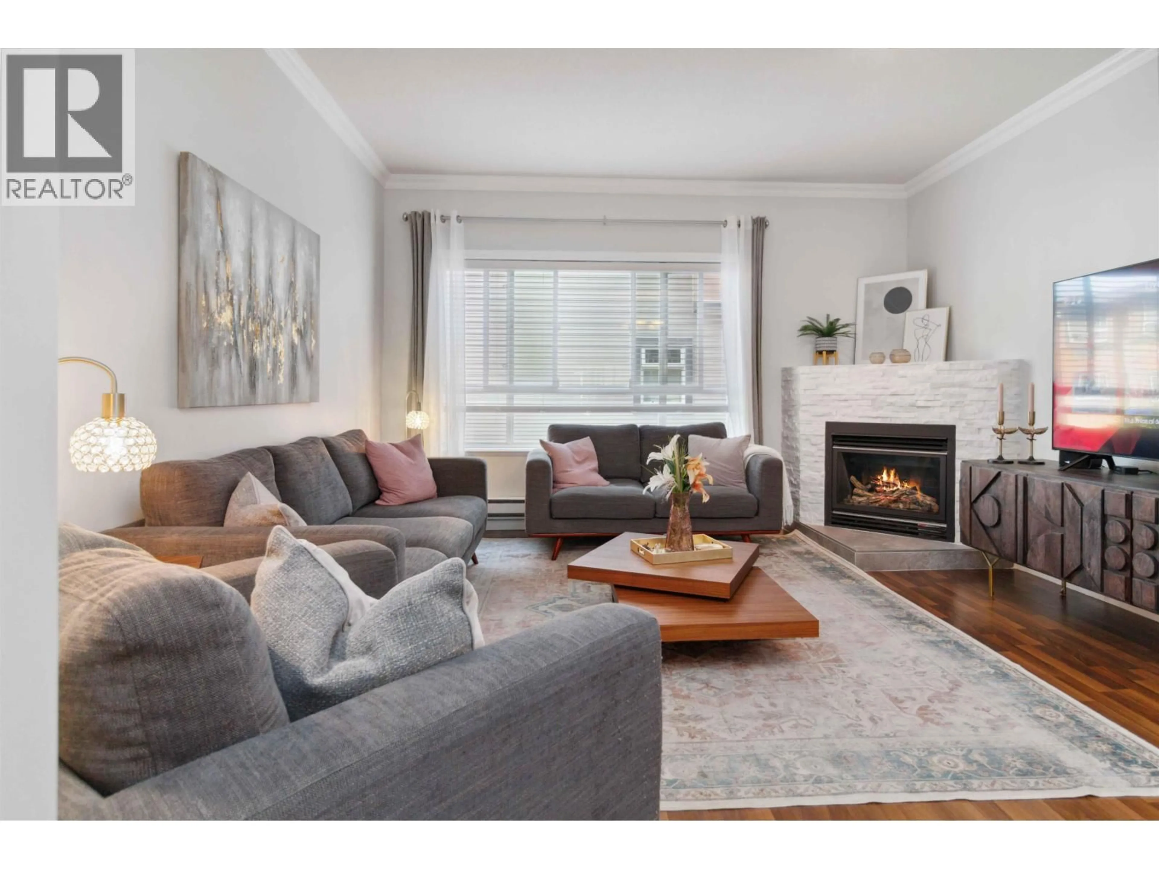 Living room with furniture, wood/laminate floor for 7 - 9420 FERNDALE ROAD, Richmond British Columbia V6Y0A7