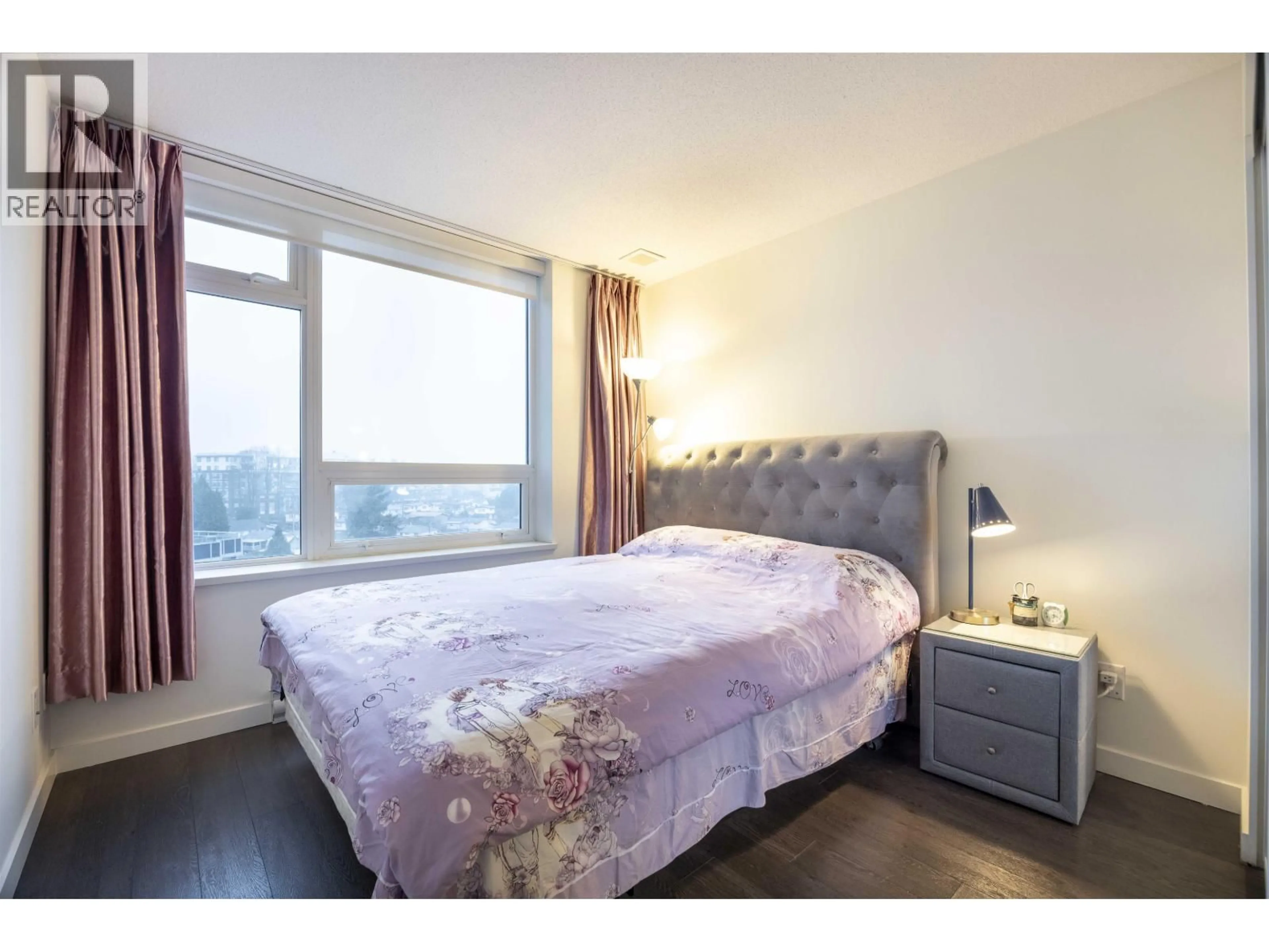 Bedroom with bed, wood/laminate floor for 1108 - 5470 ORMIDALE STREET, Vancouver British Columbia V5R0G6