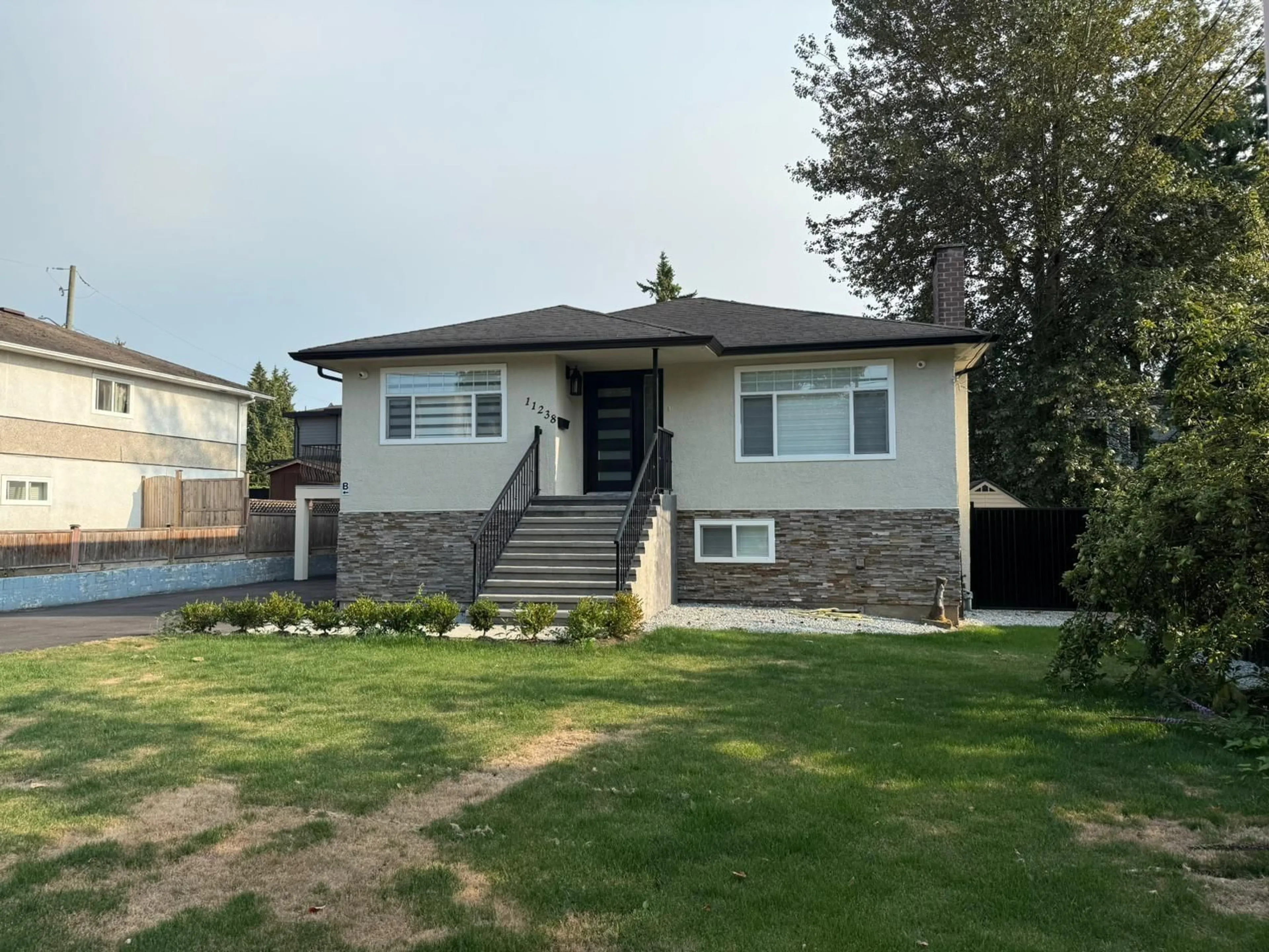 Home with vinyl exterior material, street for 11238 82, Delta British Columbia V4C2B7