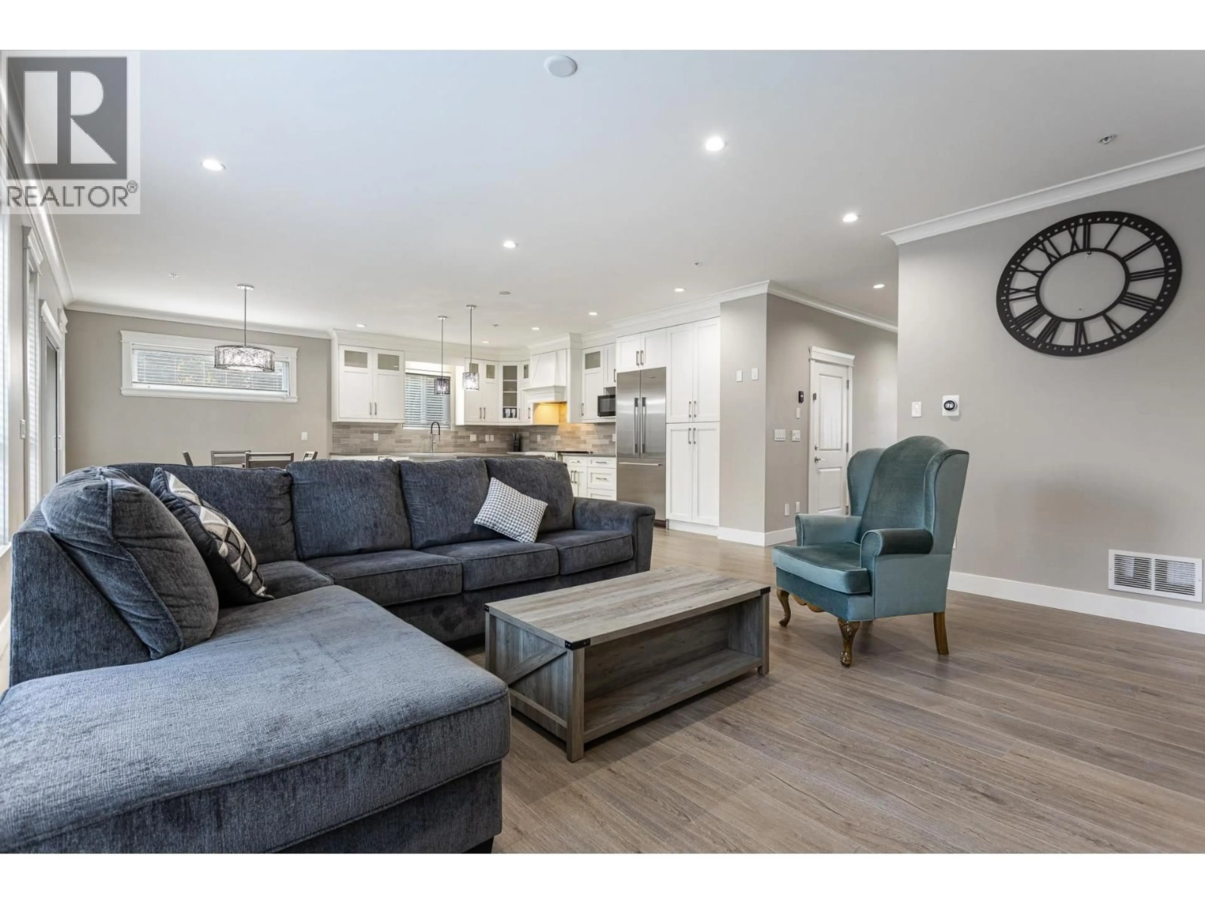 Living room with furniture, wood/laminate floor for 20417 HARTNELL AVENUE, Maple Ridge British Columbia V2X2Z5