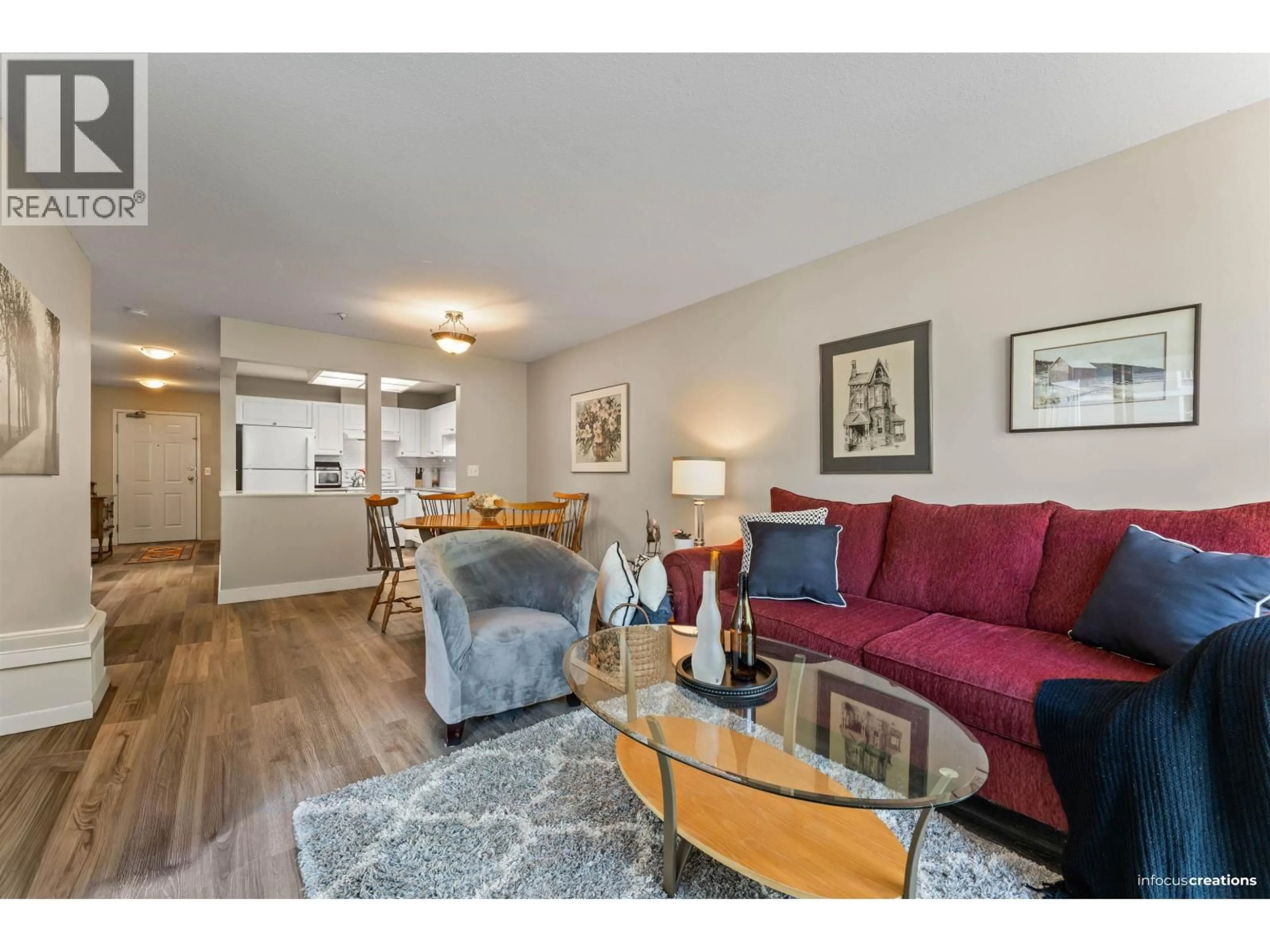 Living room with furniture, wood/laminate floor for 203 - 12155 191B STREET, Pitt Meadows British Columbia V3Y2S2