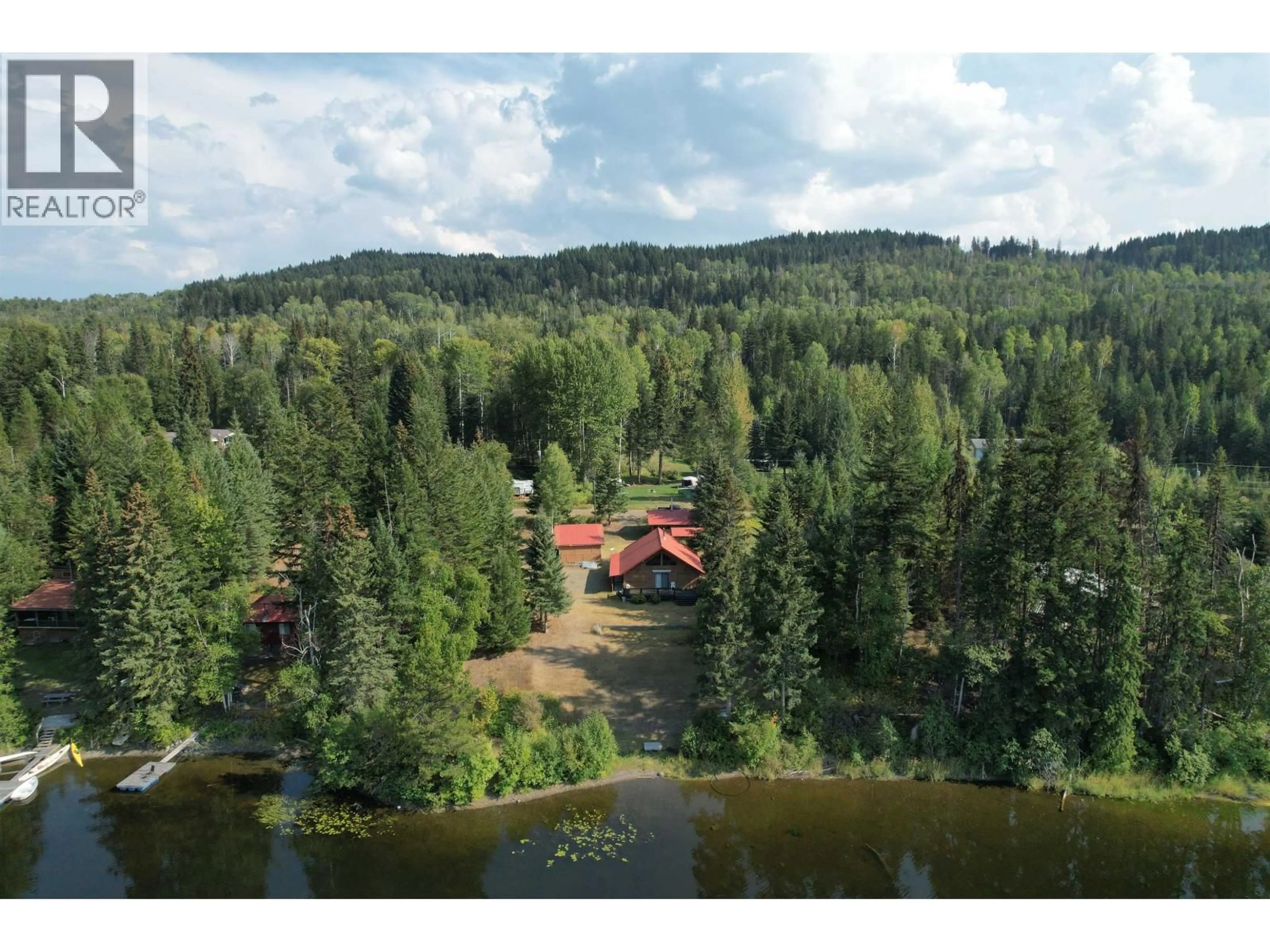 A pic from outside/outdoor area/front of a property/back of a property/a pic from drone, forest/trees view for 3578 SELLARS ROAD, Canim Lake British Columbia V0K1L0
