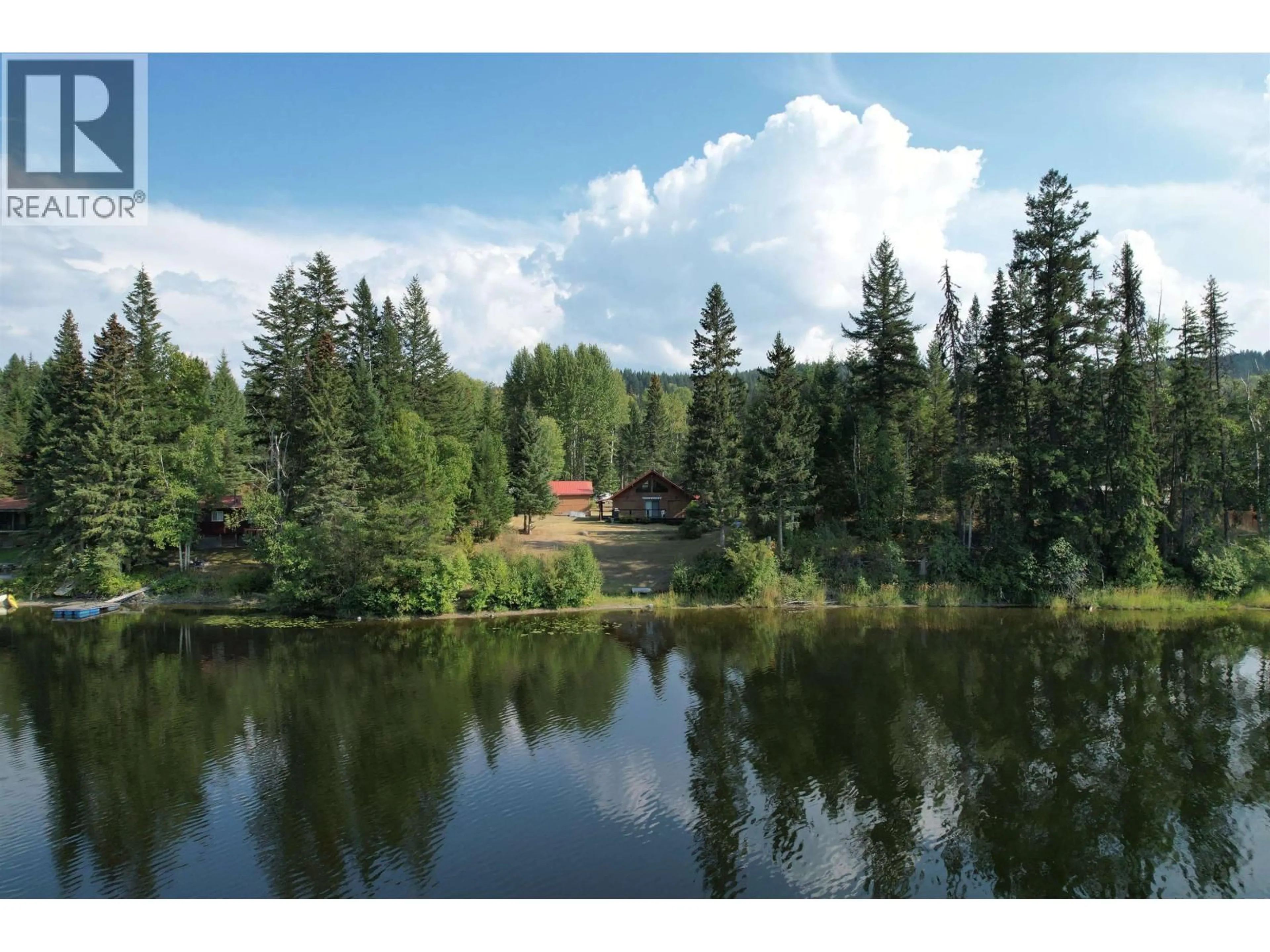 A pic from outside/outdoor area/front of a property/back of a property/a pic from drone, water/lake/river/ocean view for 3578 SELLARS ROAD, Canim Lake British Columbia V0K1L0