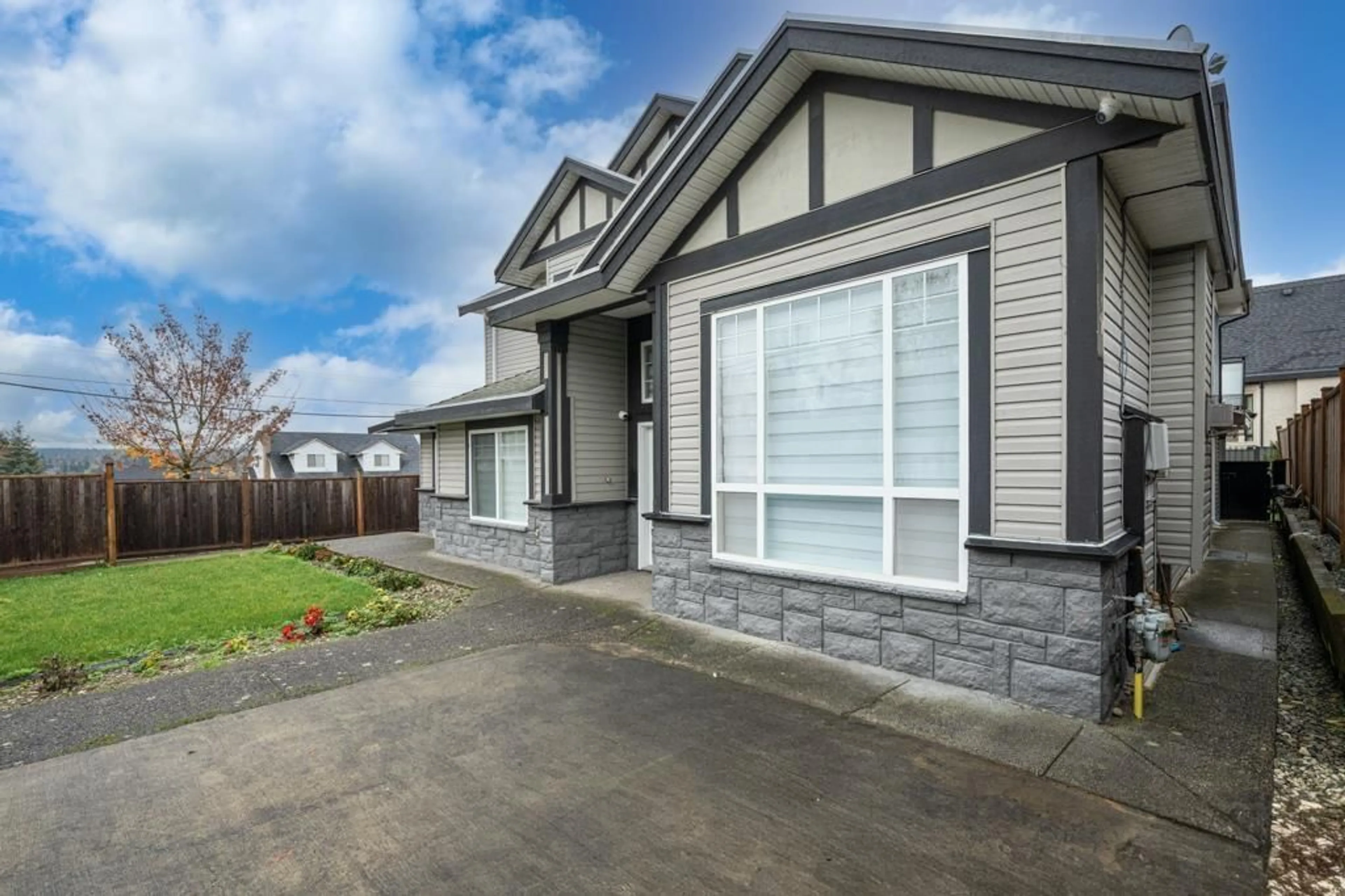 Home with vinyl exterior material, street for 7596 144 STREET, Surrey British Columbia V3W5S6