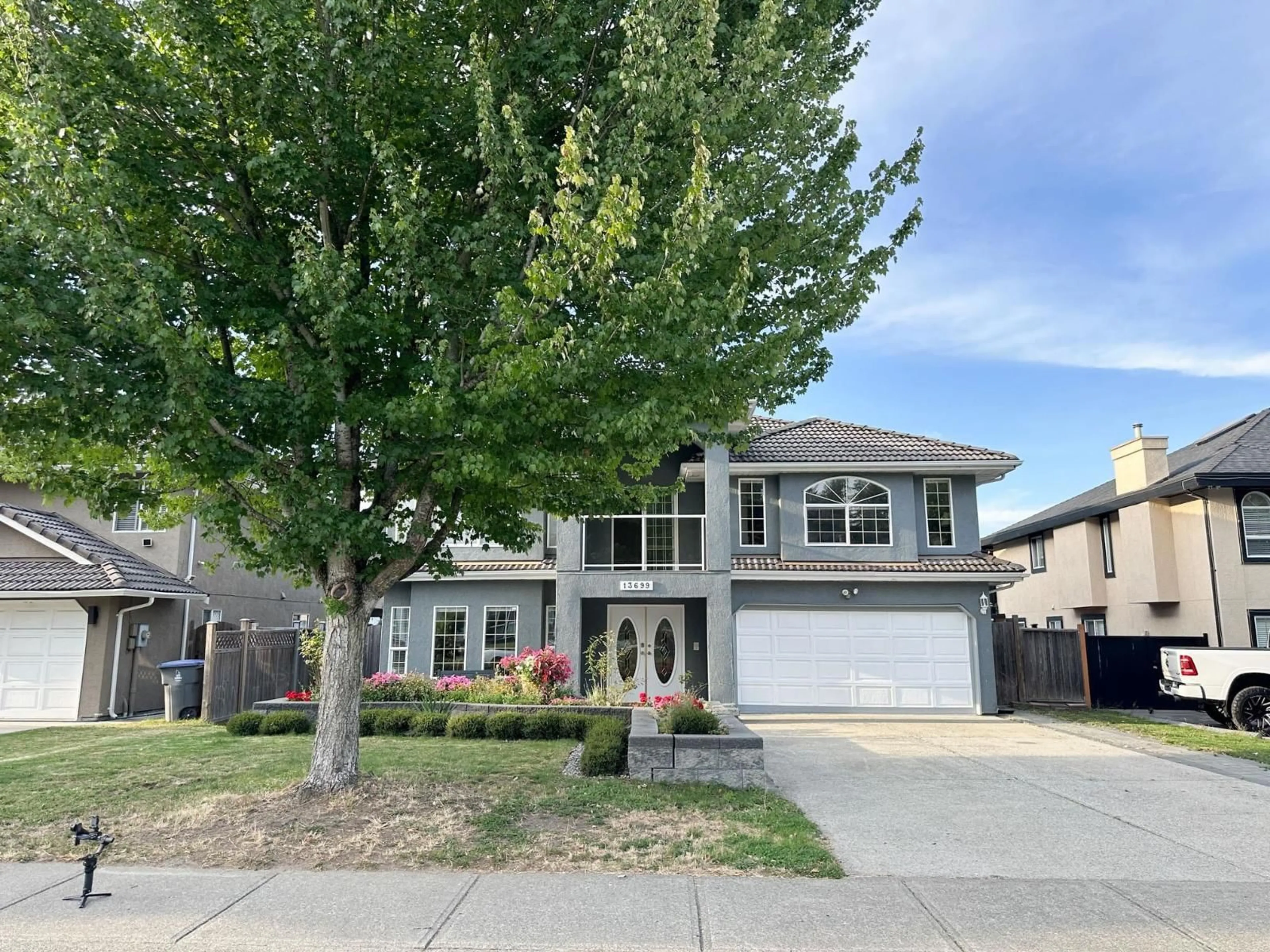 Home with vinyl exterior material, street for 13699 58A, Surrey British Columbia V3X3H9