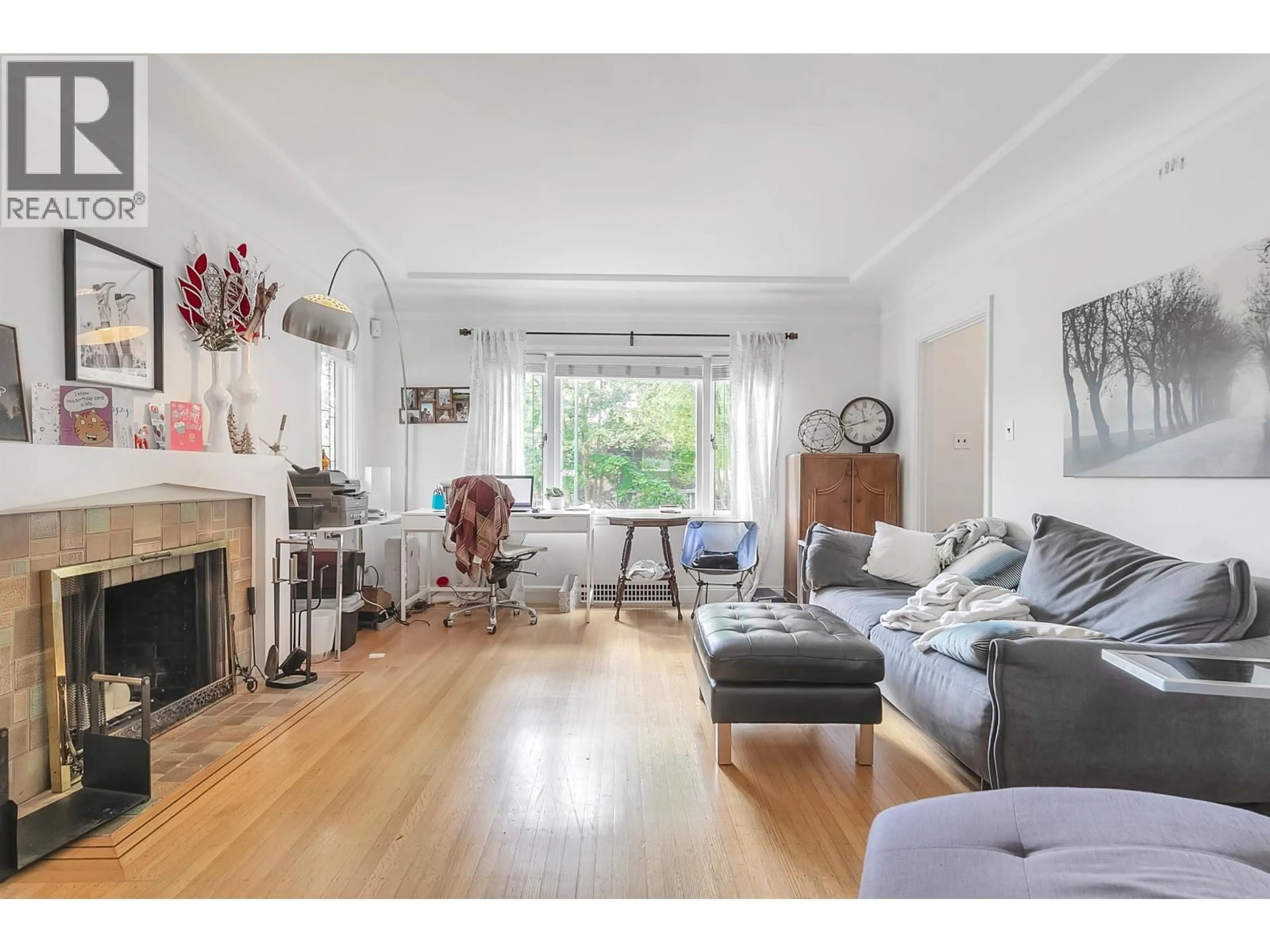 Living room with furniture, wood/laminate floor for 2903 42ND AVENUE, Vancouver British Columbia V6N3G8