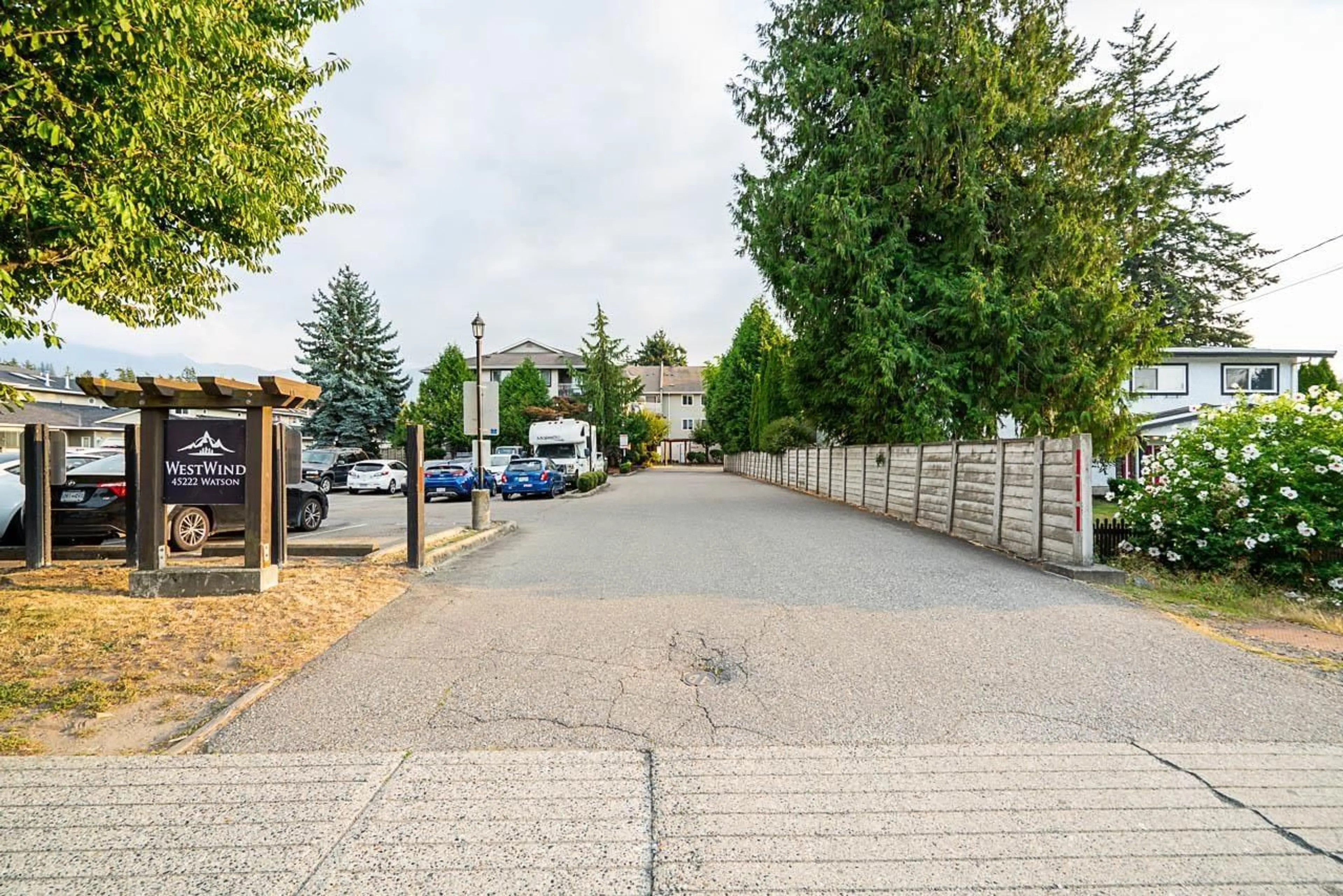 A pic from outside/outdoor area/front of a property/back of a property/a pic from drone, street for 309 - 45222 WATSON ROAD, Chilliwack British Columbia V2R3J4