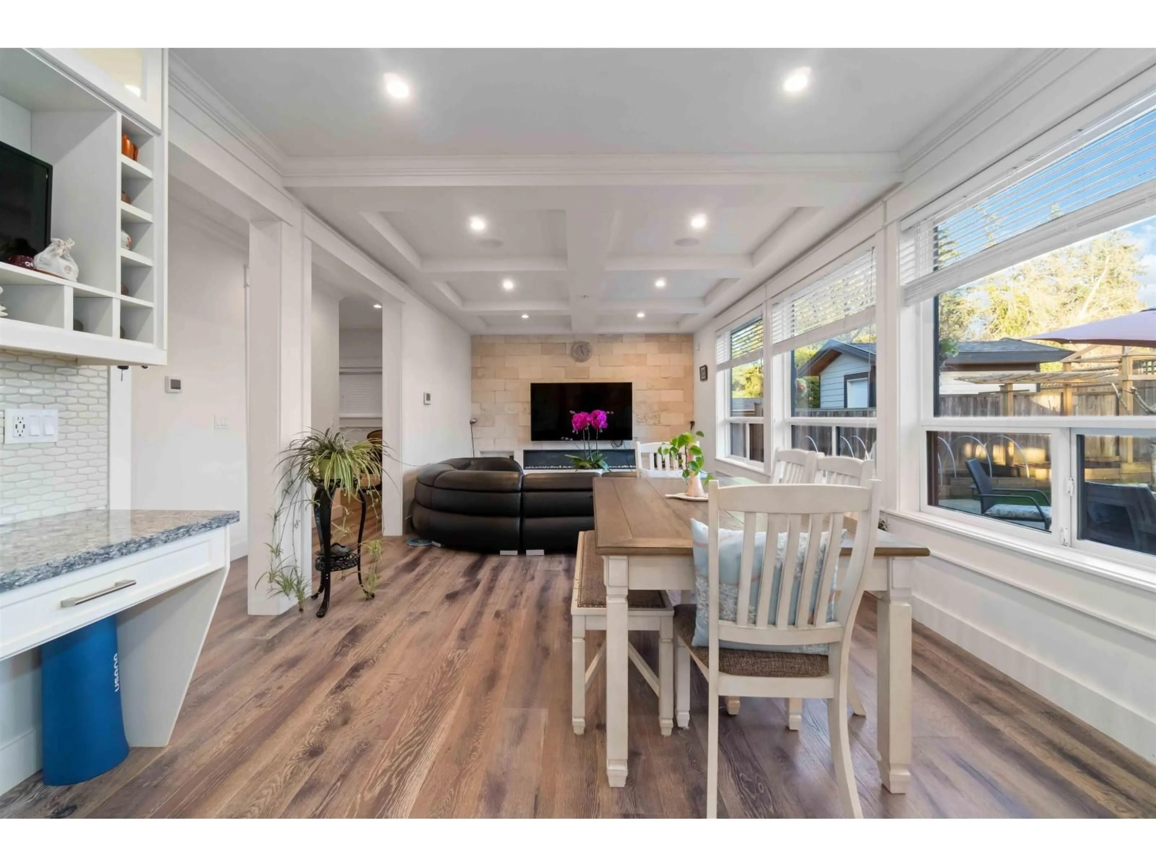 Open concept kitchen, wood/laminate floor for 8817 STEGAVIK, Delta British Columbia V4C0C6